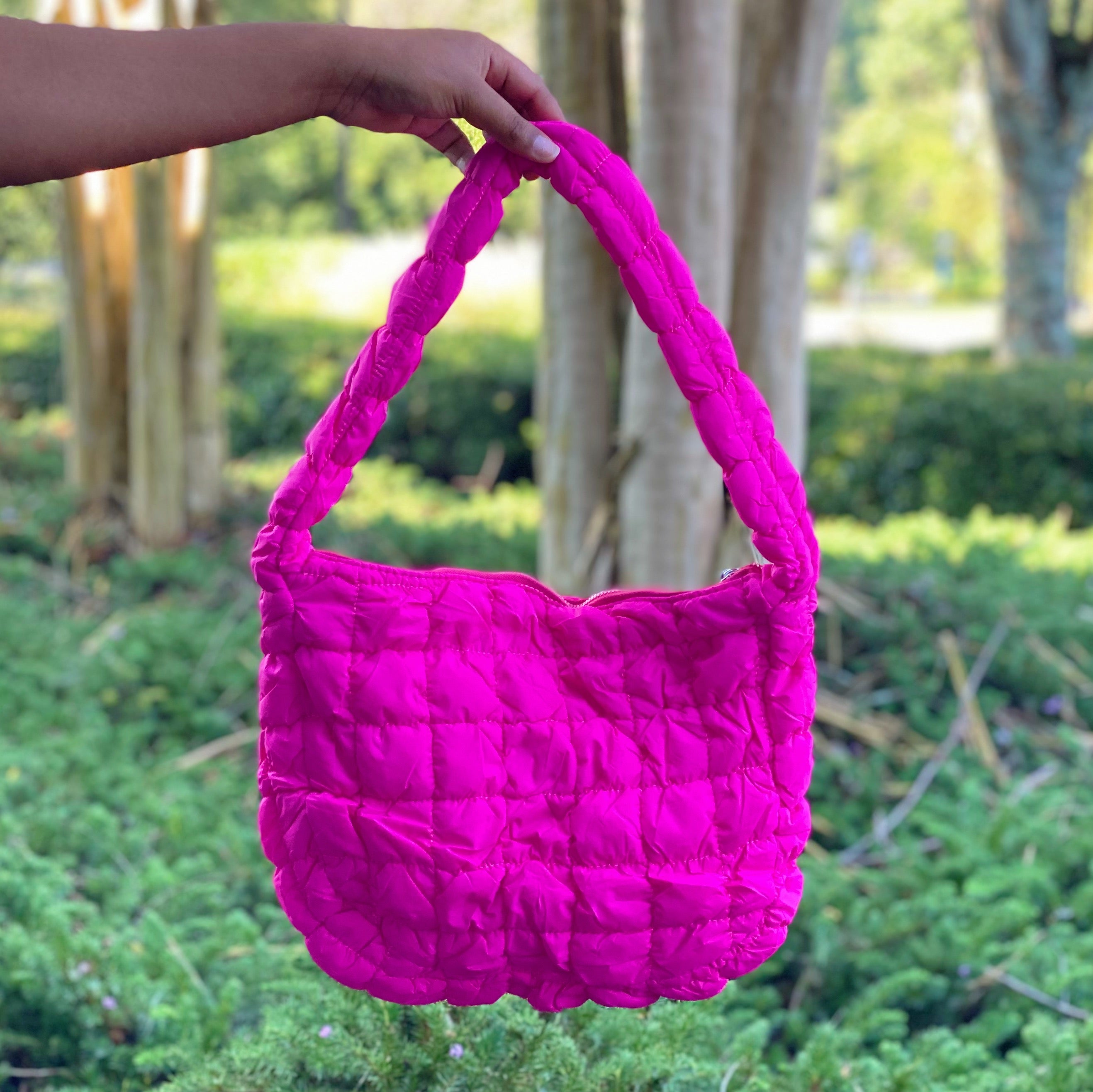 Everyday All At Once Quilted Bag in a stylish quilted design, showcasing its spacious interior and comfortable shoulder strap.