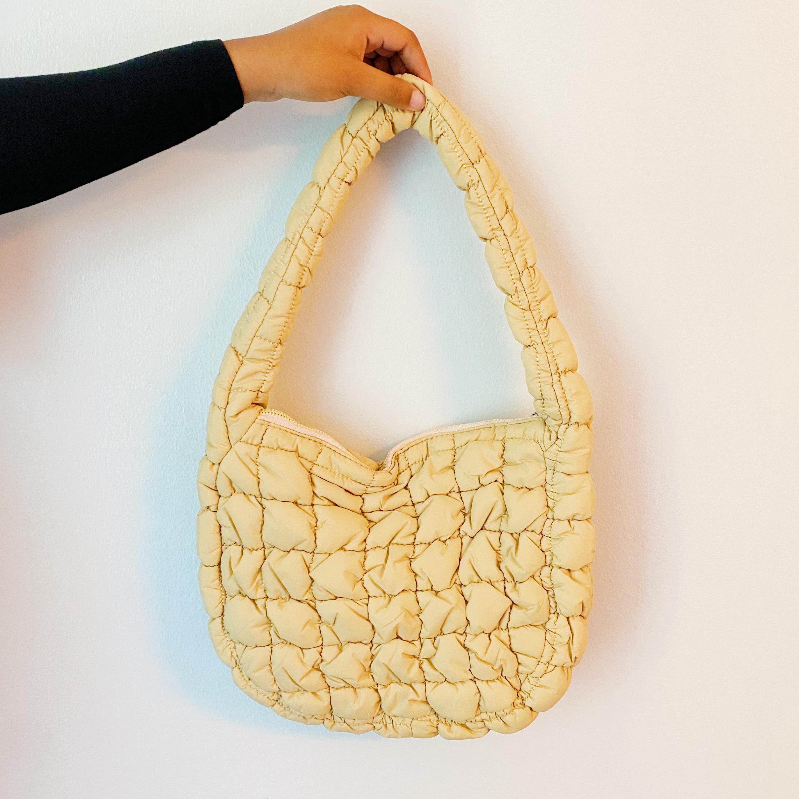 Everyday All At Once Quilted Bag in a stylish quilted design, showcasing its spacious interior and comfortable shoulder strap.