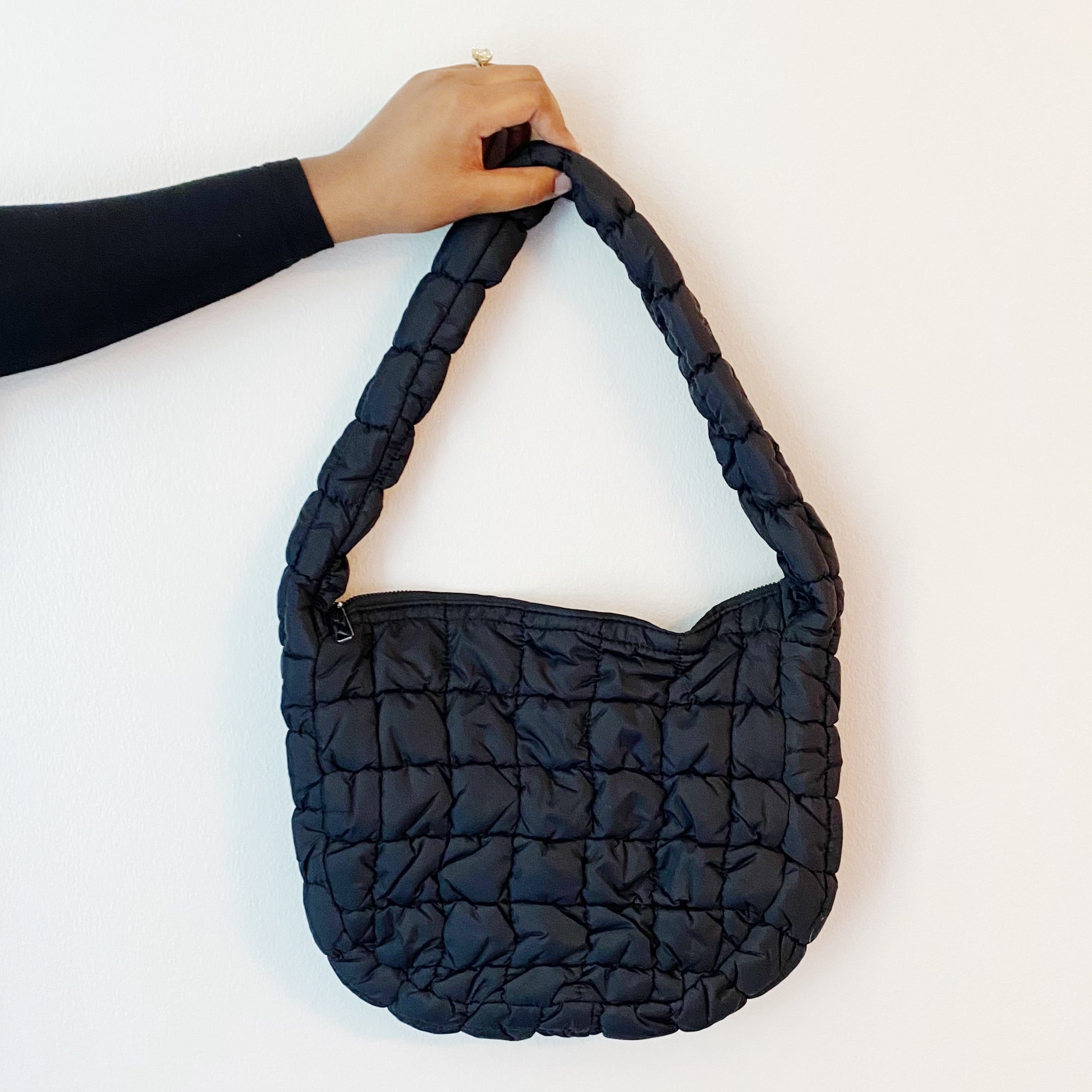 Everyday All At Once Quilted Bag in a stylish quilted design, showcasing its spacious interior and comfortable shoulder strap.