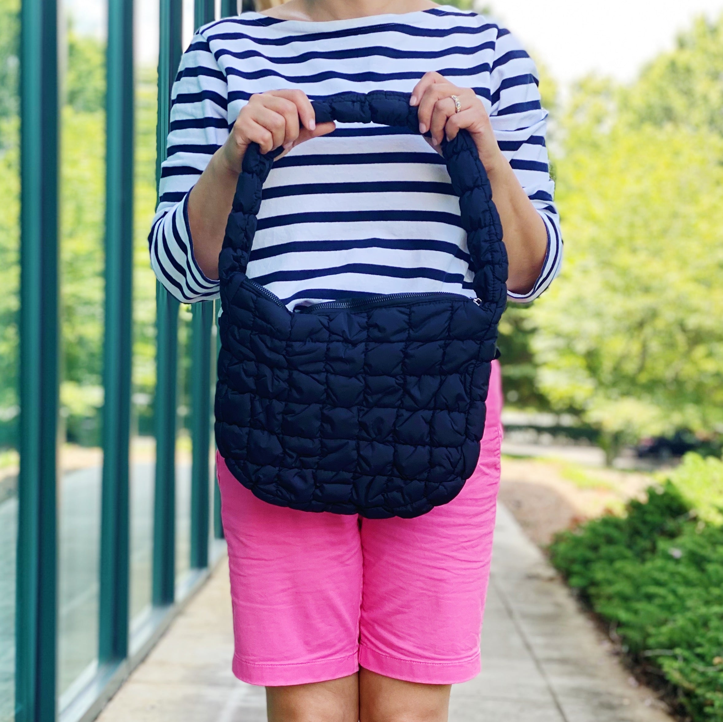 Everyday All At Once Quilted Bag in a stylish quilted design, showcasing its spacious interior and comfortable shoulder strap.