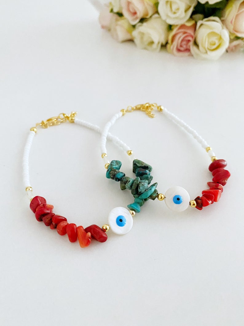 Evil Eye Anklet featuring mother of pearl evil eye bead and baroque beads, handmade with seed beads in a stylish boho design.