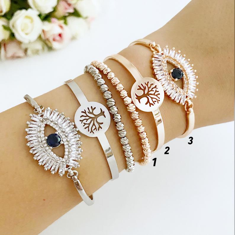 Evil Eye Baguette Bracelet in rose gold featuring a tree of life design, handmade with adjustable stainless steel material.