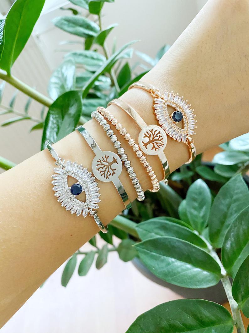 Evil Eye Baguette Bracelet in rose gold featuring a tree of life design, handmade with adjustable stainless steel material.