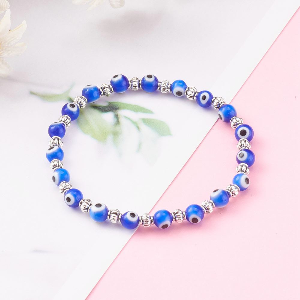 Evil Eye Beaded Stretch Bracelet featuring blue beads and alloy spacer beads, symbolizing protection and good luck.