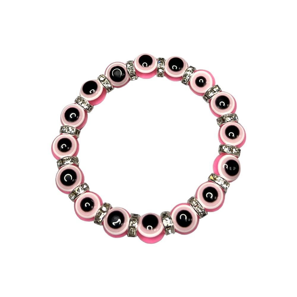 A beautifully crafted pink evil eye bracelet featuring a traditional charm, symbolizing protection and good luck, handmade with care.