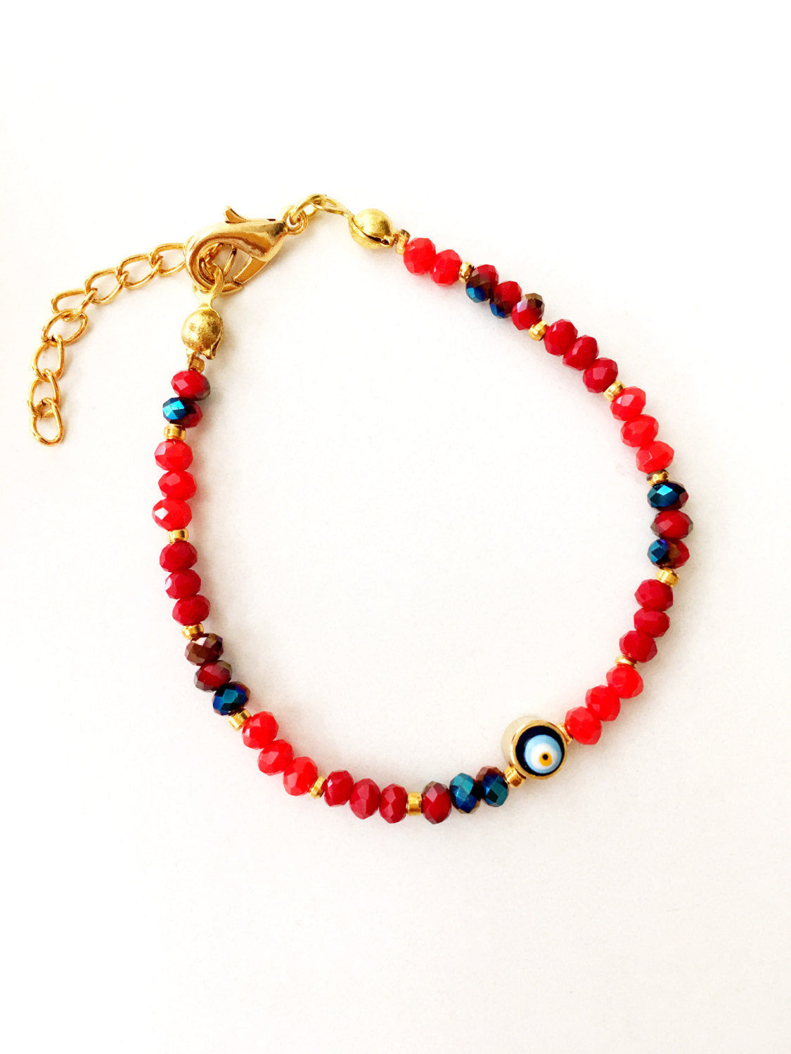 Handmade Evil Eye Bracelet featuring red Miyuki seed beads, symbolizing protection and luck.