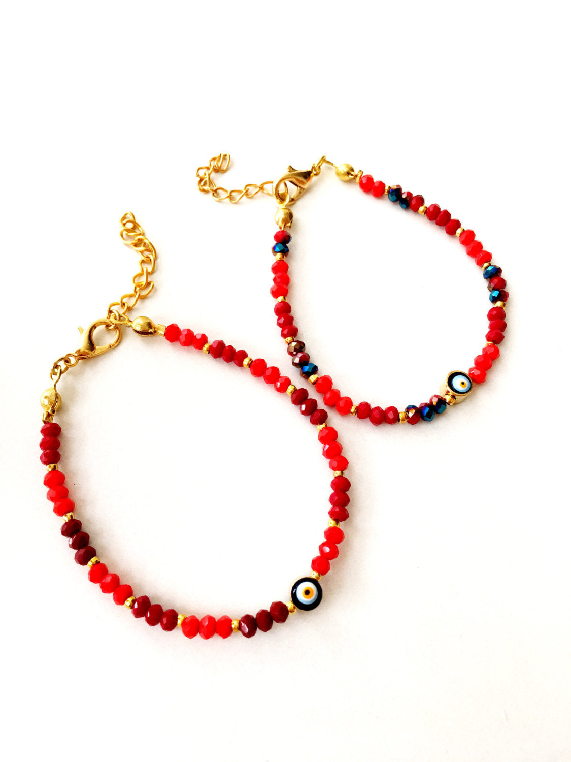 Handmade Evil Eye Bracelet featuring red Miyuki seed beads, symbolizing protection and luck.