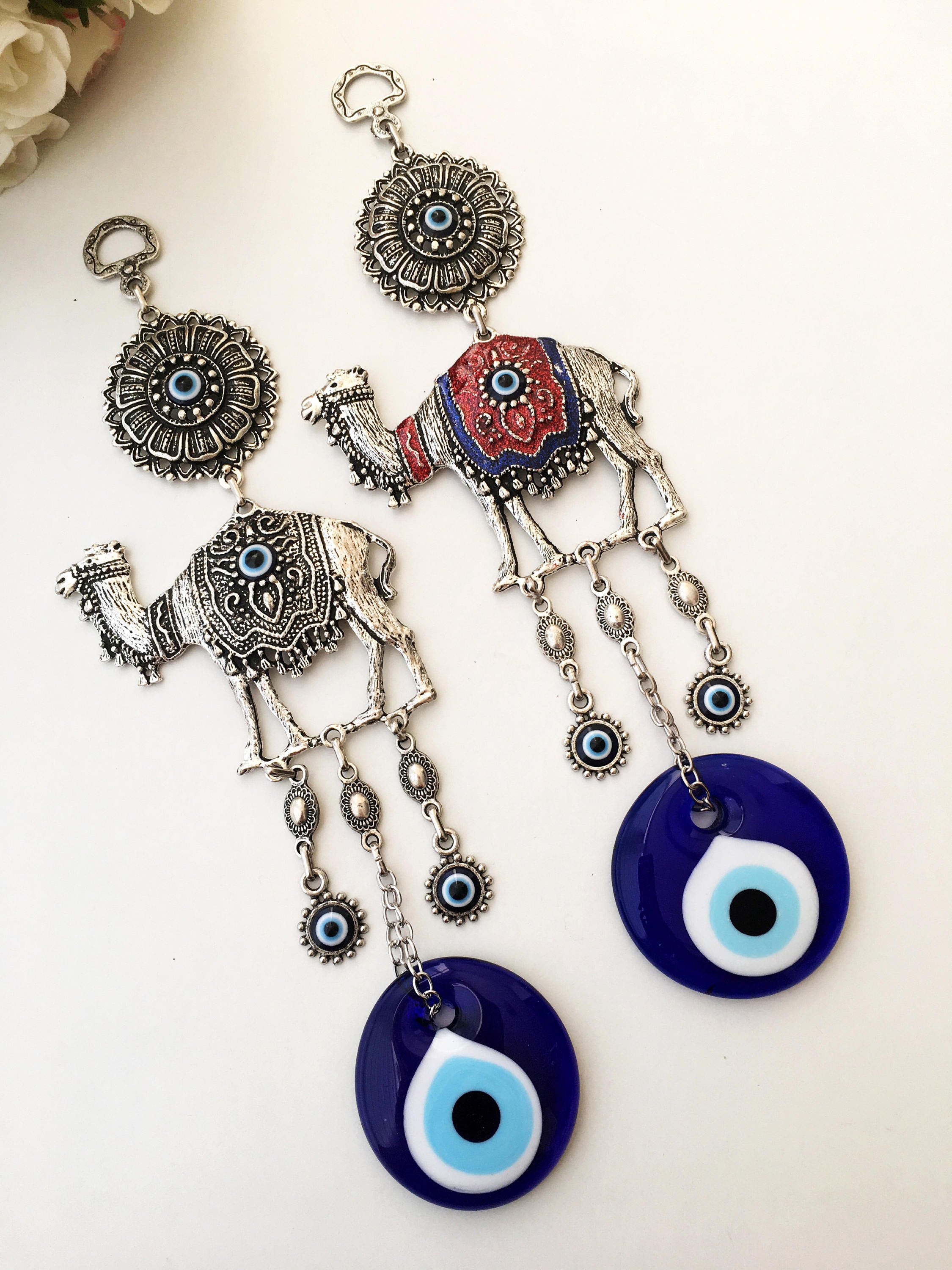 Handmade Evil Eye Camel Wall Hanging featuring traditional Turkish evil eye design in silver and red colors, symbolizing protection and good luck.