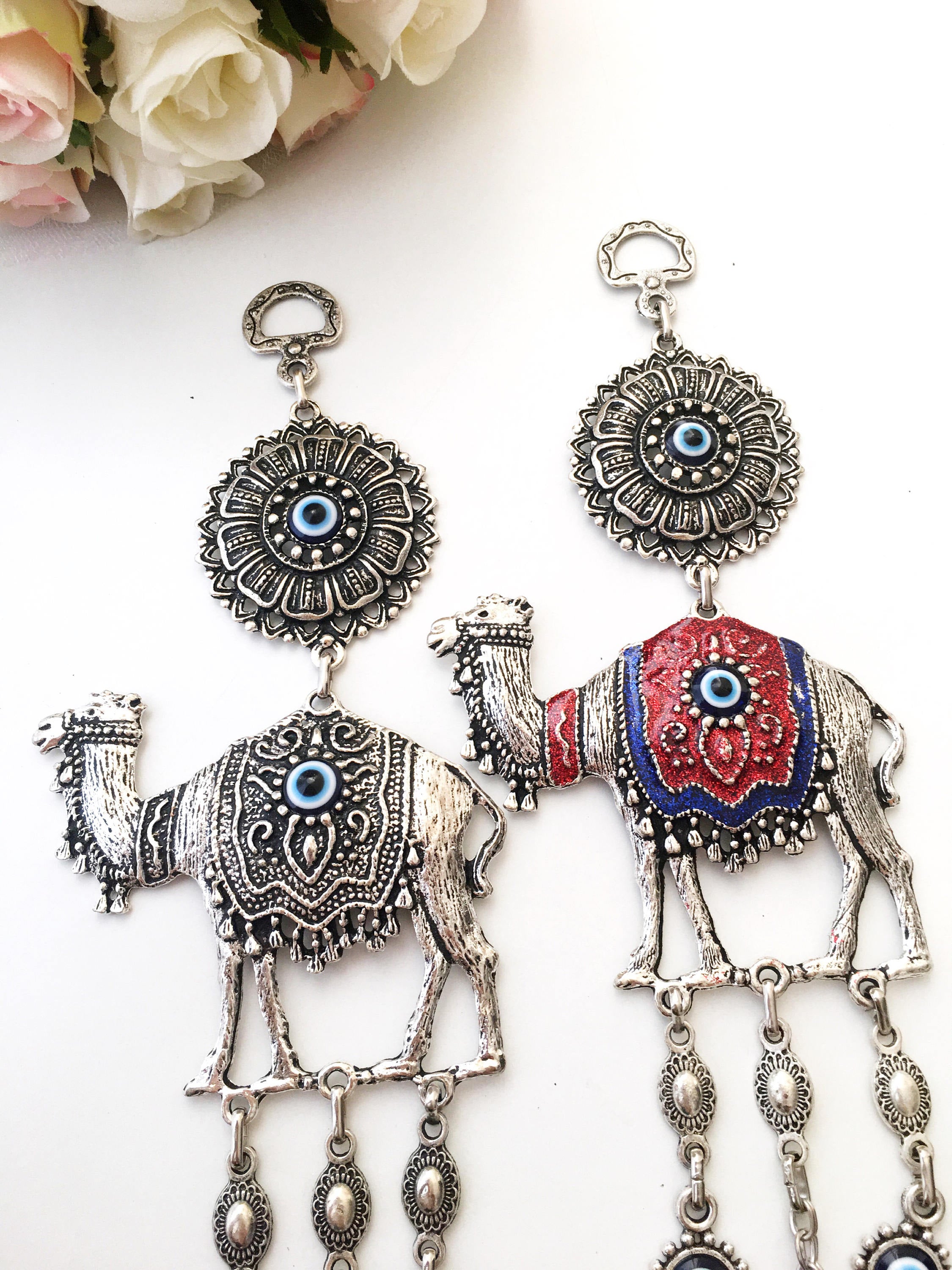 Handmade Evil Eye Camel Wall Hanging featuring traditional Turkish evil eye design in silver and red colors, symbolizing protection and good luck.