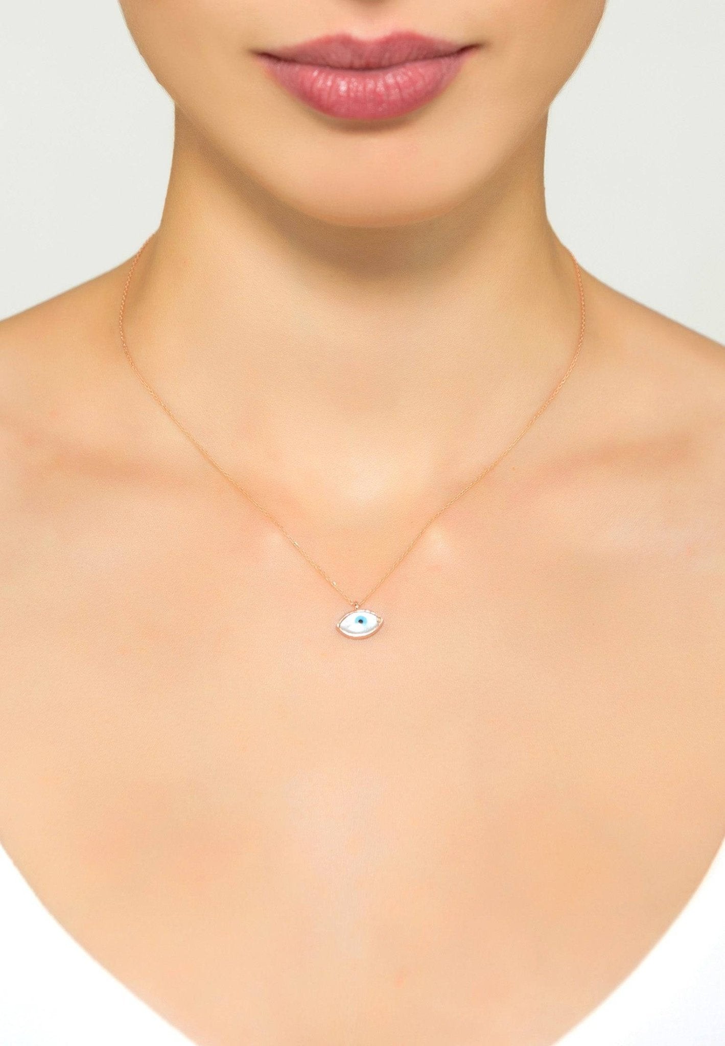 Evil Eye Elliptical Mother Of Pearl Necklace in gold with delicate design and sparkling white zircons.