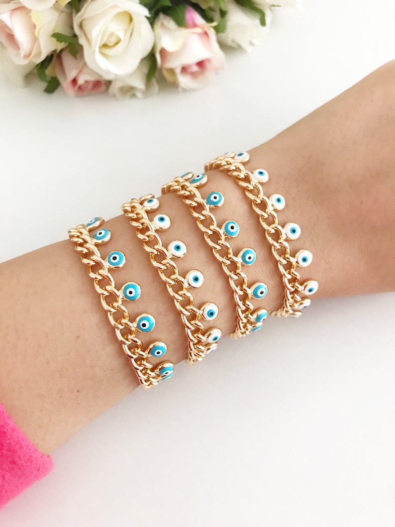 Evil Eye Gold Chain Bracelet featuring blue and white beads with a gold chain, showcasing a 10mm evil eye charm.