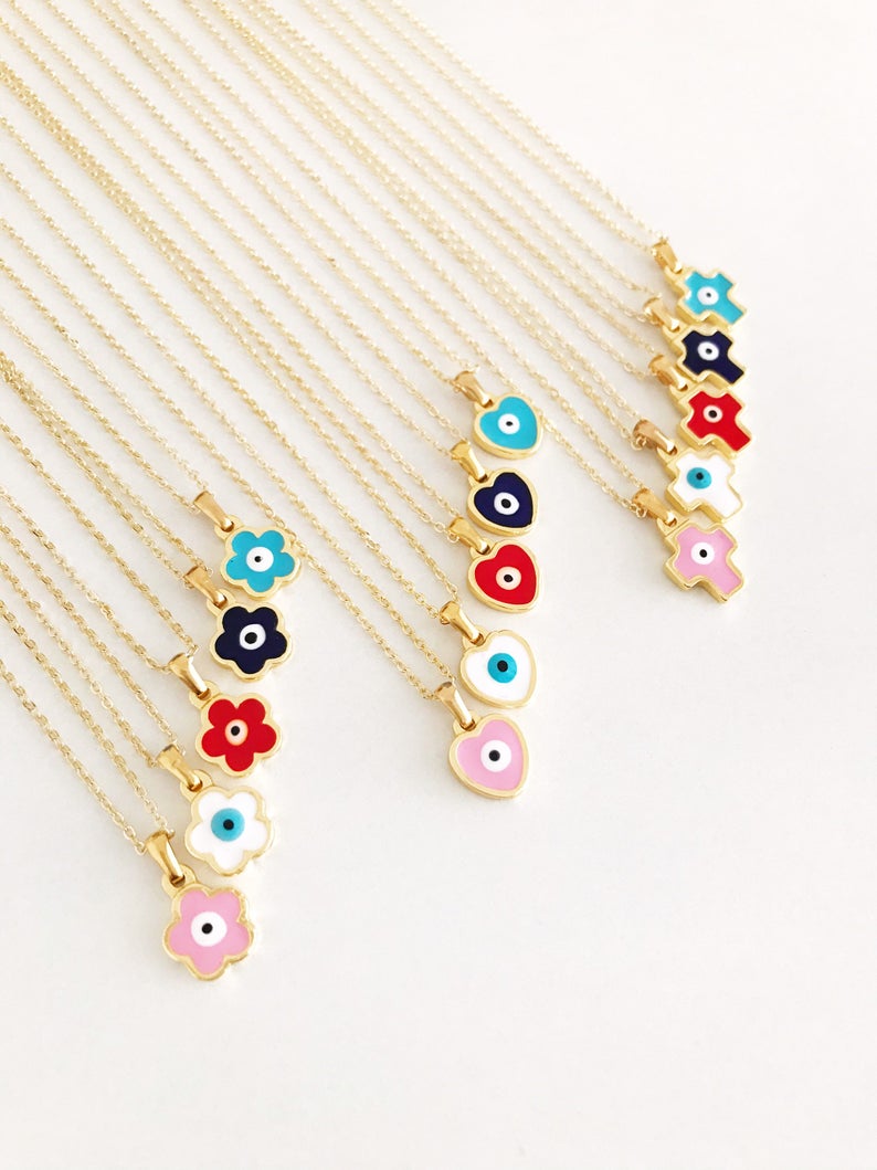 Handmade Evil Eye Necklace featuring customizable flower, heart, and cross charms in vibrant colors.