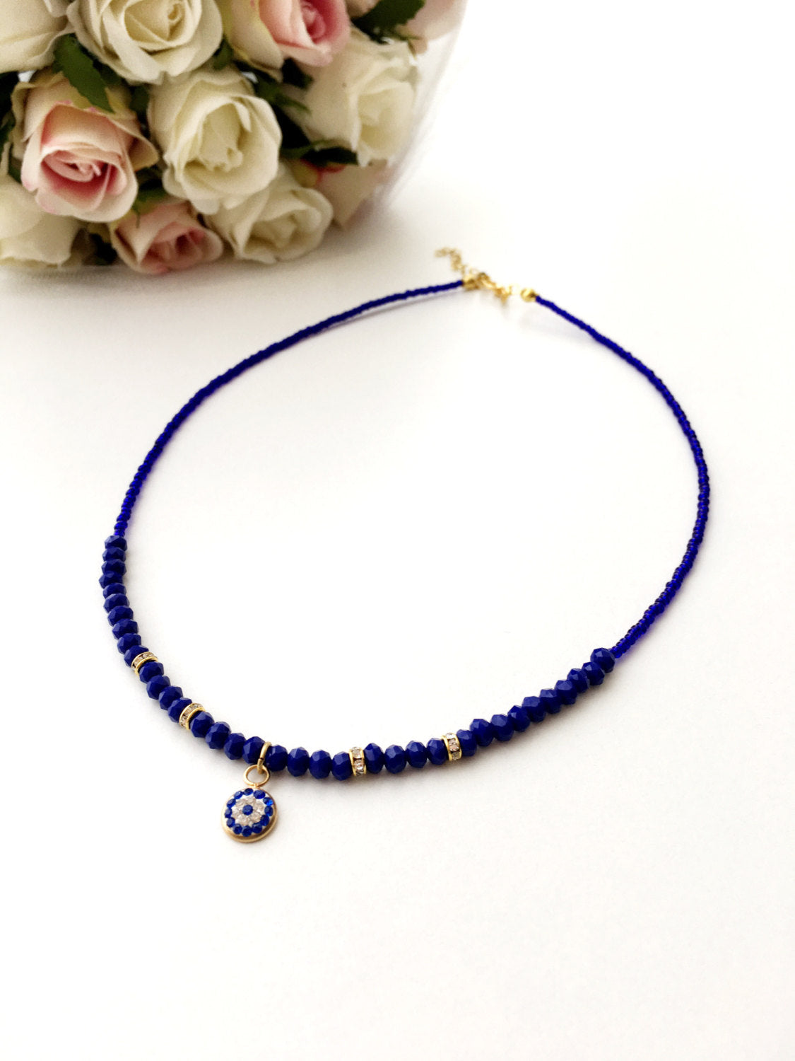 Handmade Evil Eye Necklace featuring Miyuki beads in blue, with rose or gold plating options, adjustable chain length.