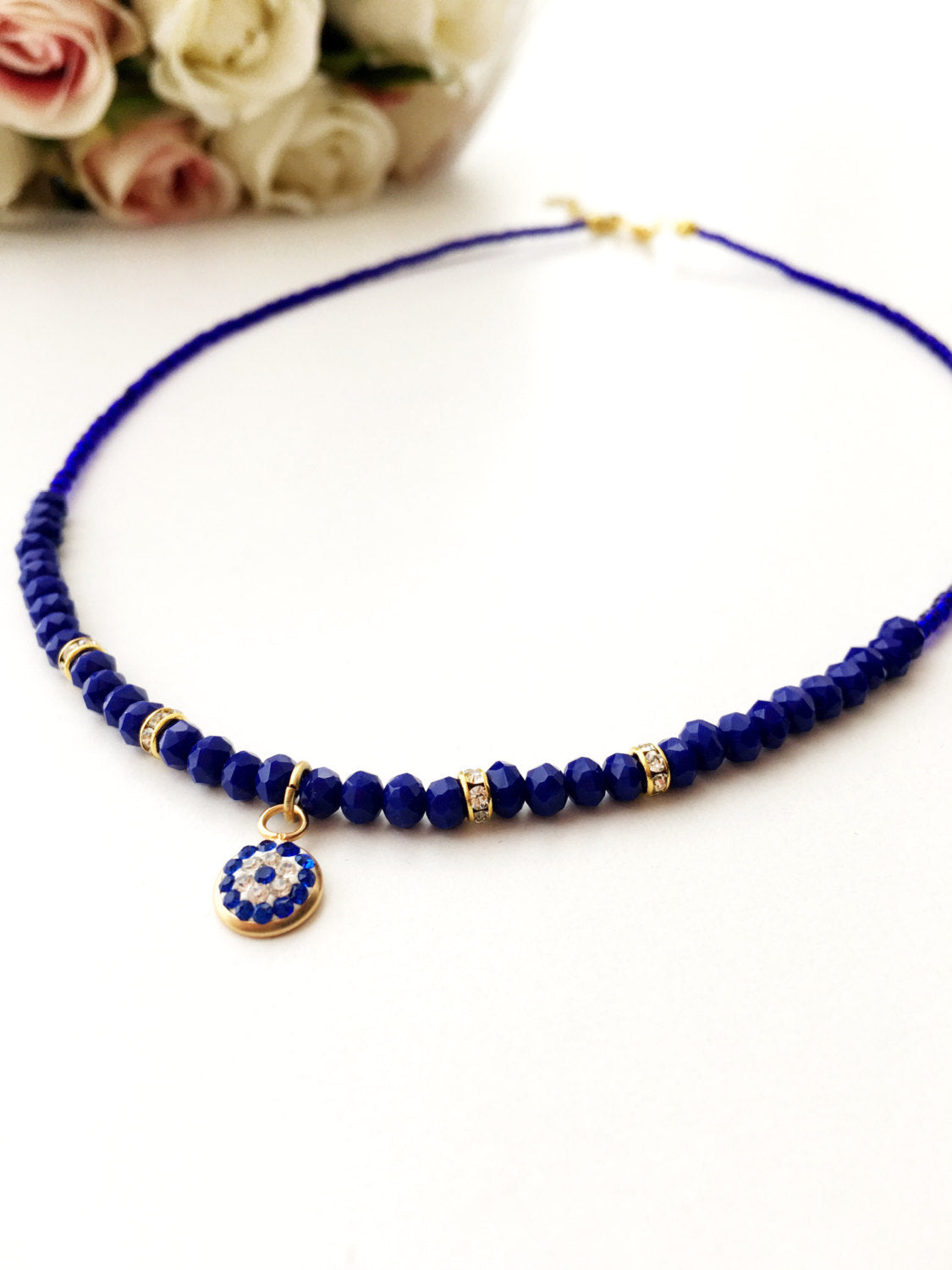 Handmade Evil Eye Necklace featuring Miyuki beads in blue, with rose or gold plating options, adjustable chain length.