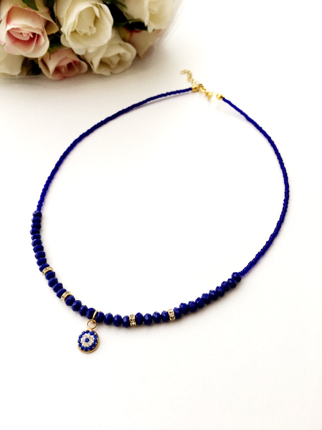 Handmade Evil Eye Necklace featuring Miyuki beads in blue, with rose or gold plating options, adjustable chain length.