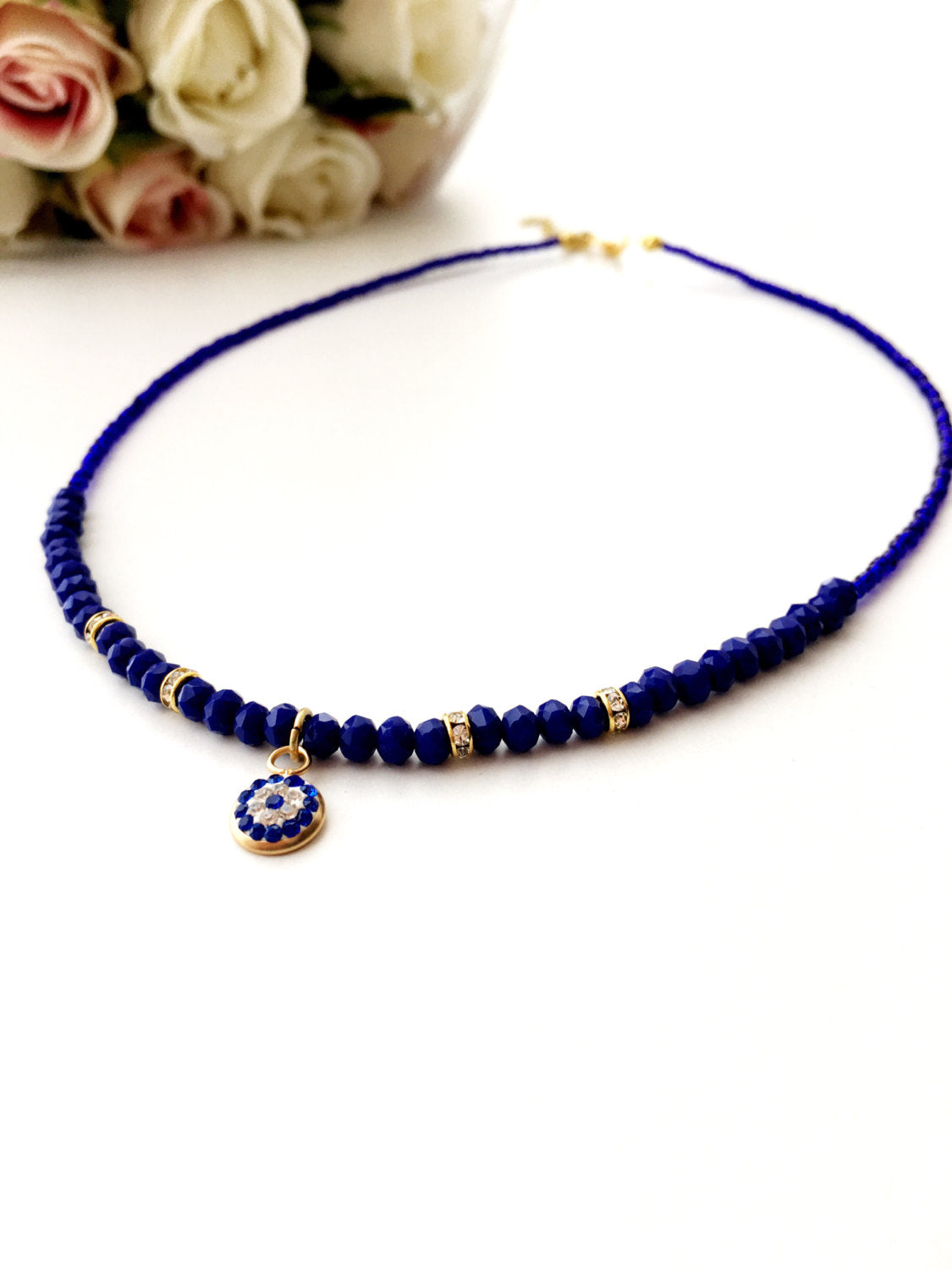 Handmade Evil Eye Necklace featuring Miyuki beads in blue, with rose or gold plating options, adjustable chain length.