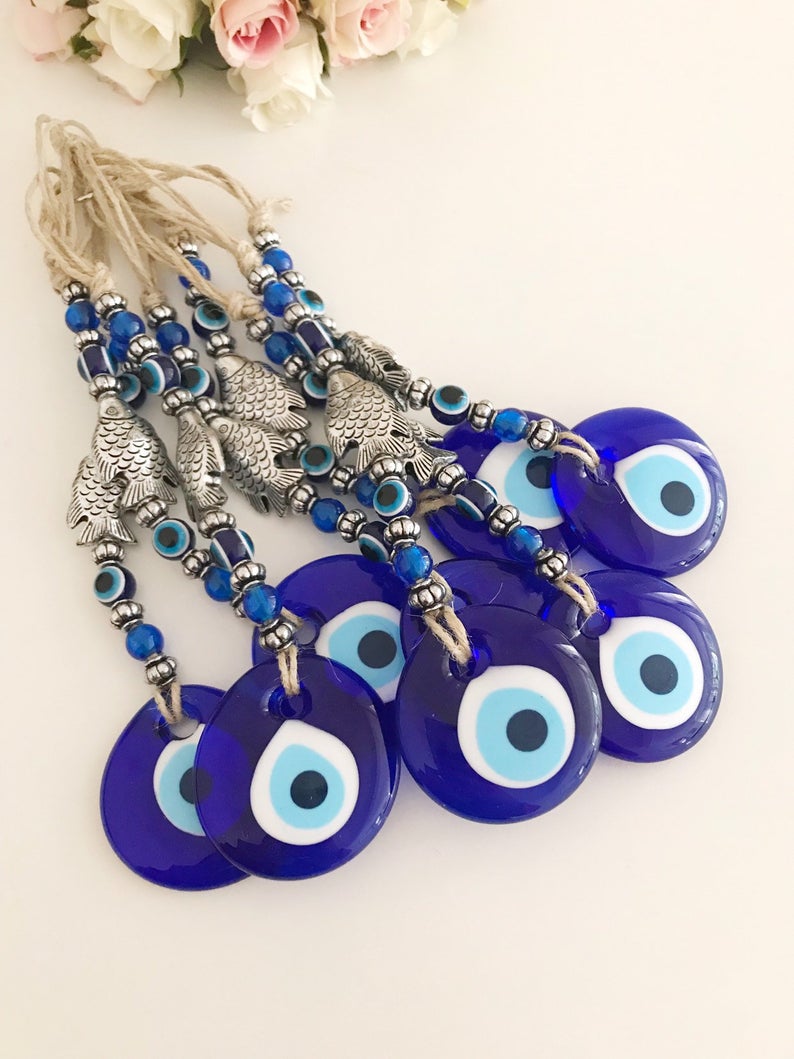 Handmade Evil Eye Wall Hanging featuring a fish lucky charm in silver and turquoise colors, measuring 27cm in length.