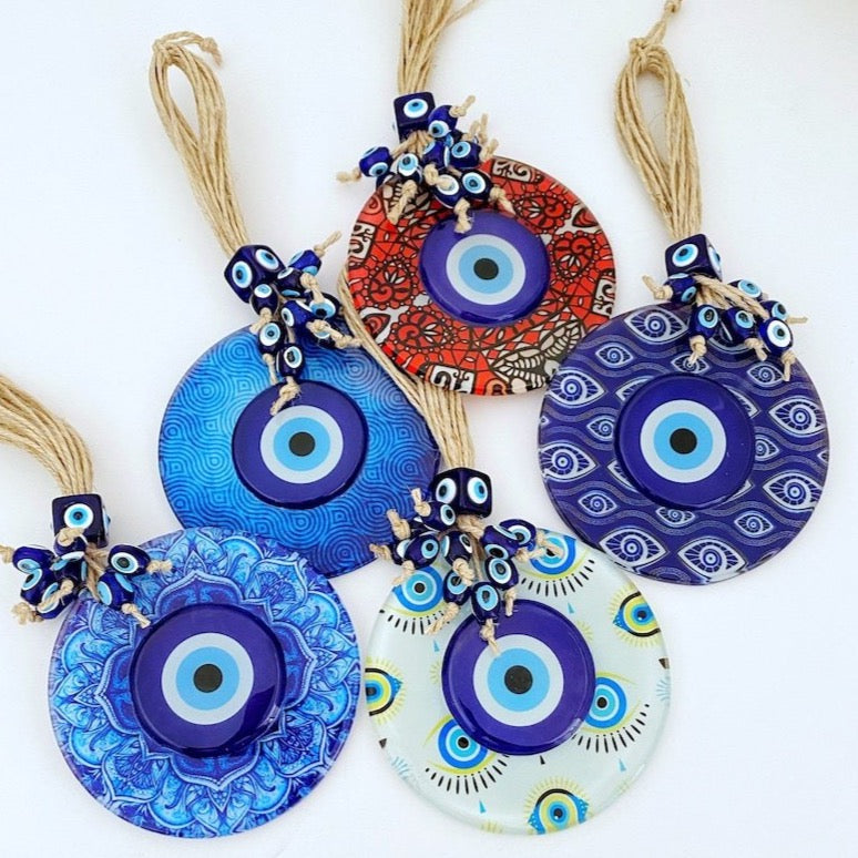 Handmade Evil Eye Wall Hanging featuring mosaic glass and evil eye beads, perfect for home decoration and protection.