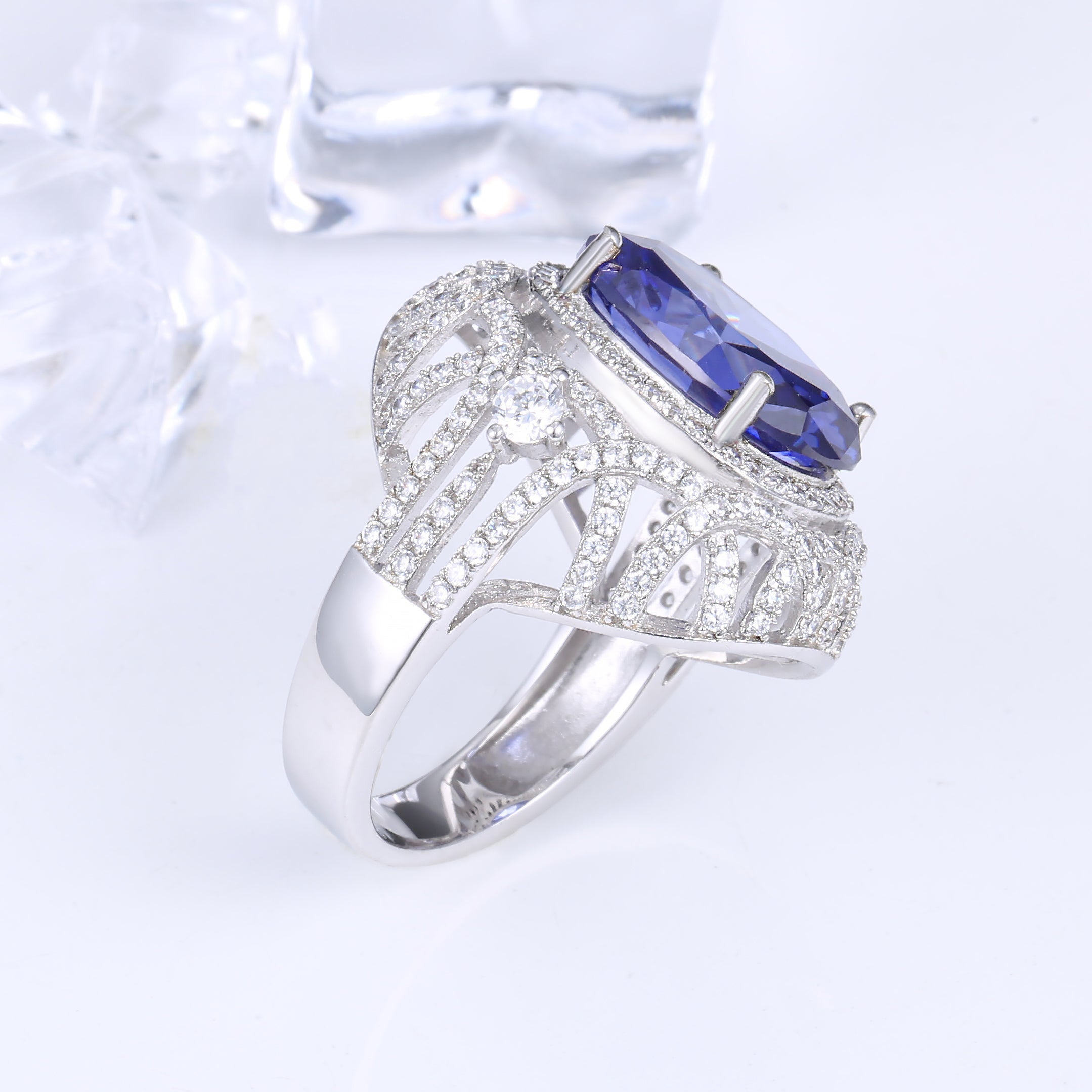 Excellent cut tanzanite luxury ring in 925 sterling silver with white gold finish, featuring a stunning Lachouette gemstone.