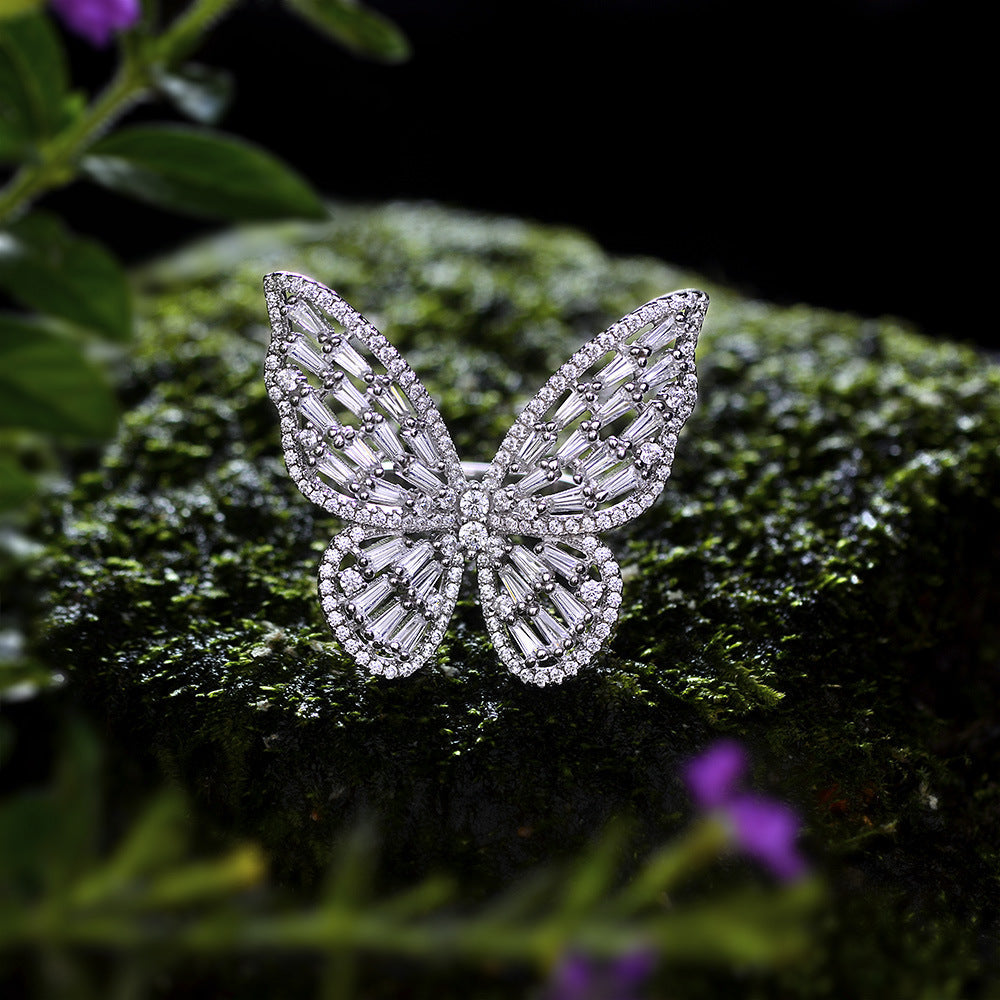 A beautifully crafted butterfly ring made of 925 sterling silver with a white gold finish, showcasing exquisite workmanship.