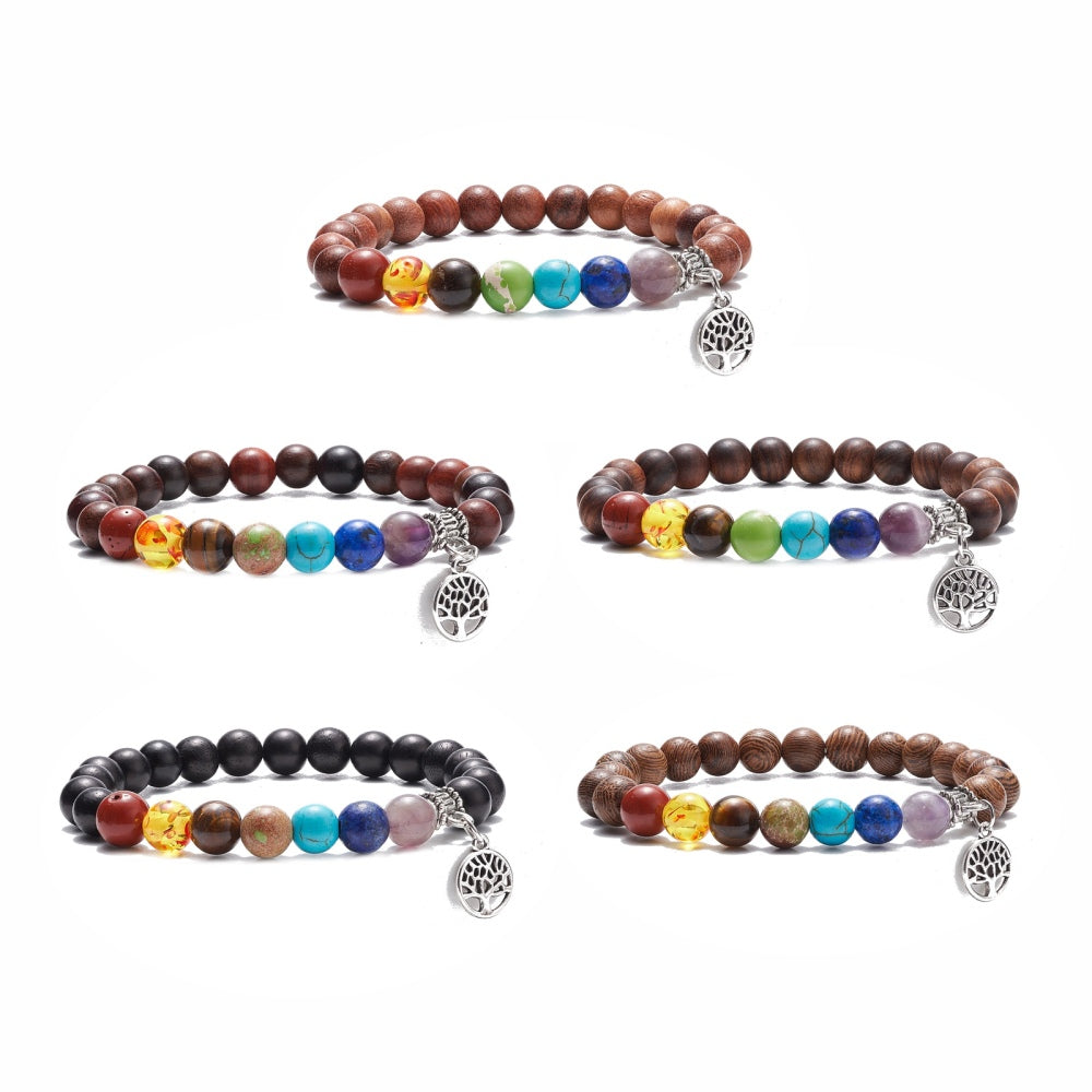 Family Tree Chakra Beaded Stretch Bracelet featuring colorful chakra beads on a brown kraft packaging tag.