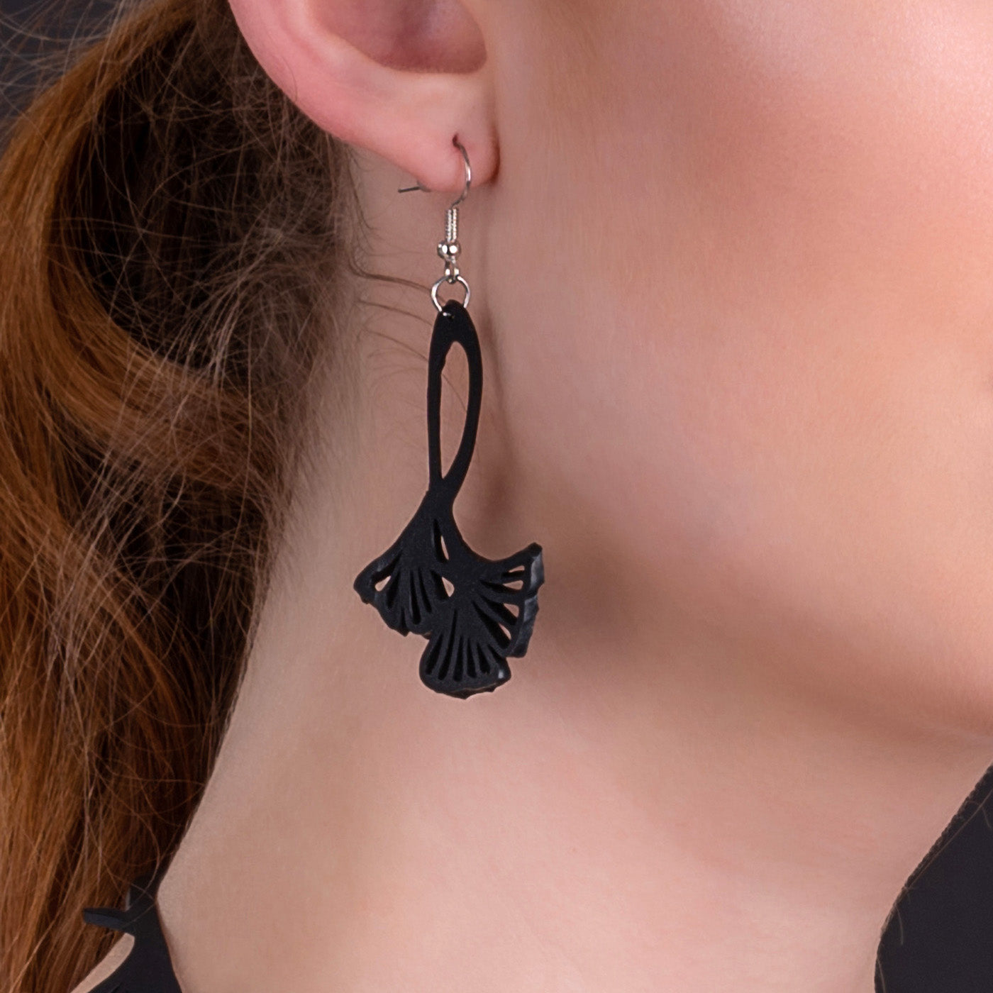 Handcrafted Fan Leaf Recycle Rubber Clover Earrings made from reclaimed rubber, featuring a four-leaf design symbolizing faith, hope, love, and luck.