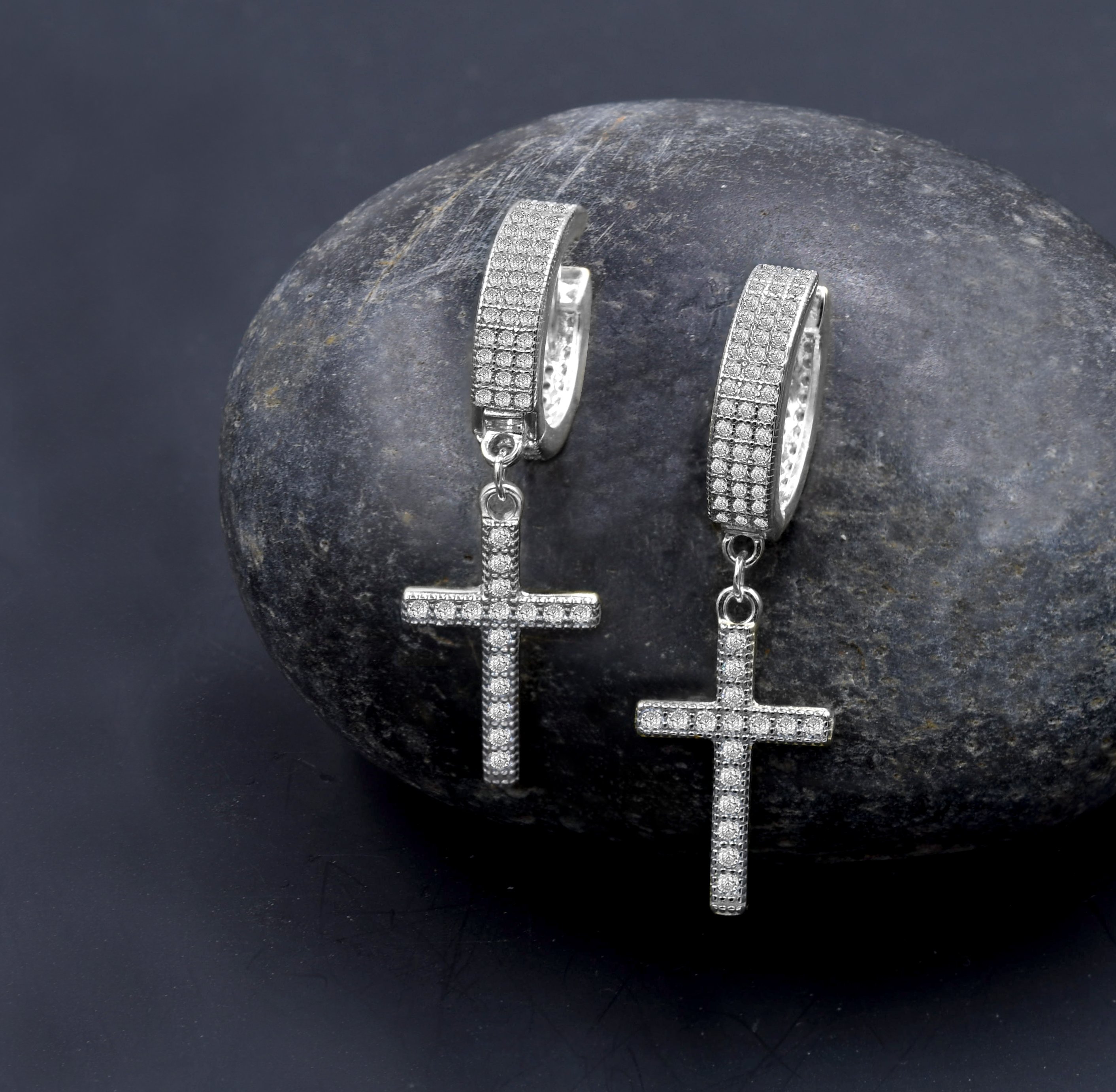 Fancy 925 earrings featuring cubic zircon stones set in sterling silver, showcasing a lightweight and elegant design.