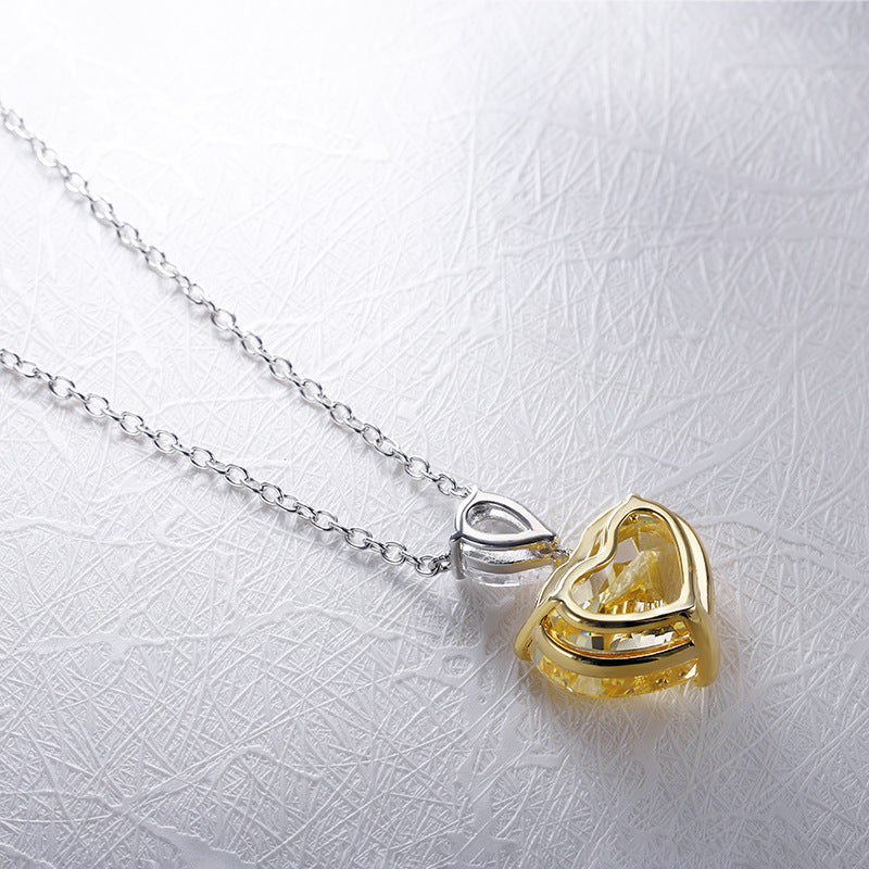 Elegant fancy heart necklace made of 925 sterling silver and real white gold, showcasing a beautiful heart design.