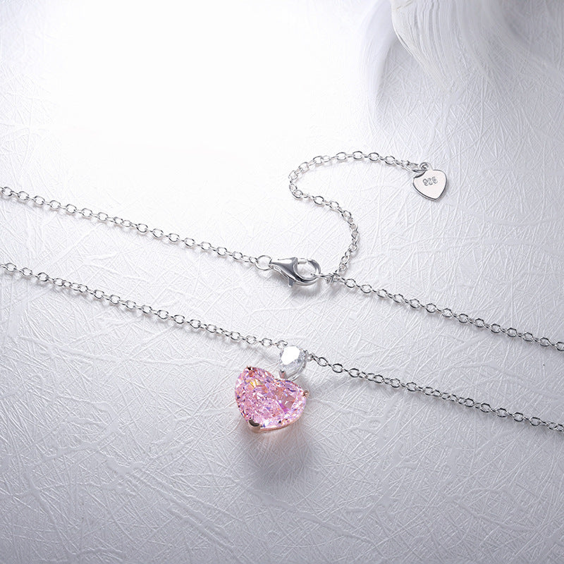 Elegant fancy heart necklace made of 925 sterling silver and real white gold, showcasing a beautiful heart design.