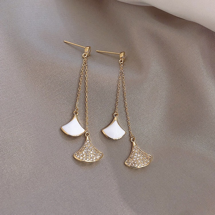 Elegant fanshaped drop earrings made of alloy and 925 silver, showcasing intricate design and craftsmanship.