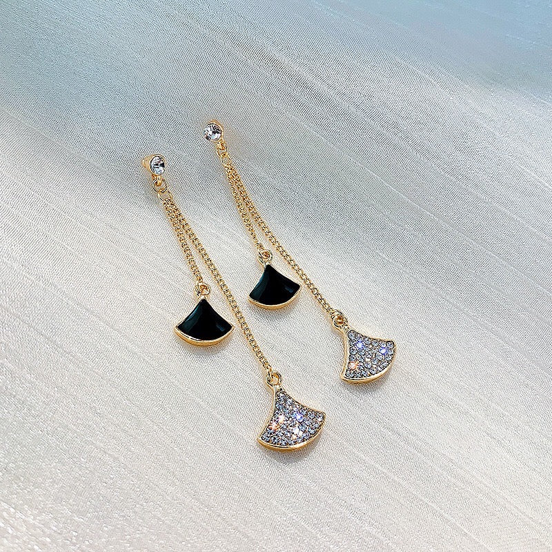 Elegant fanshaped drop earrings made of alloy and 925 silver, showcasing intricate design and craftsmanship.