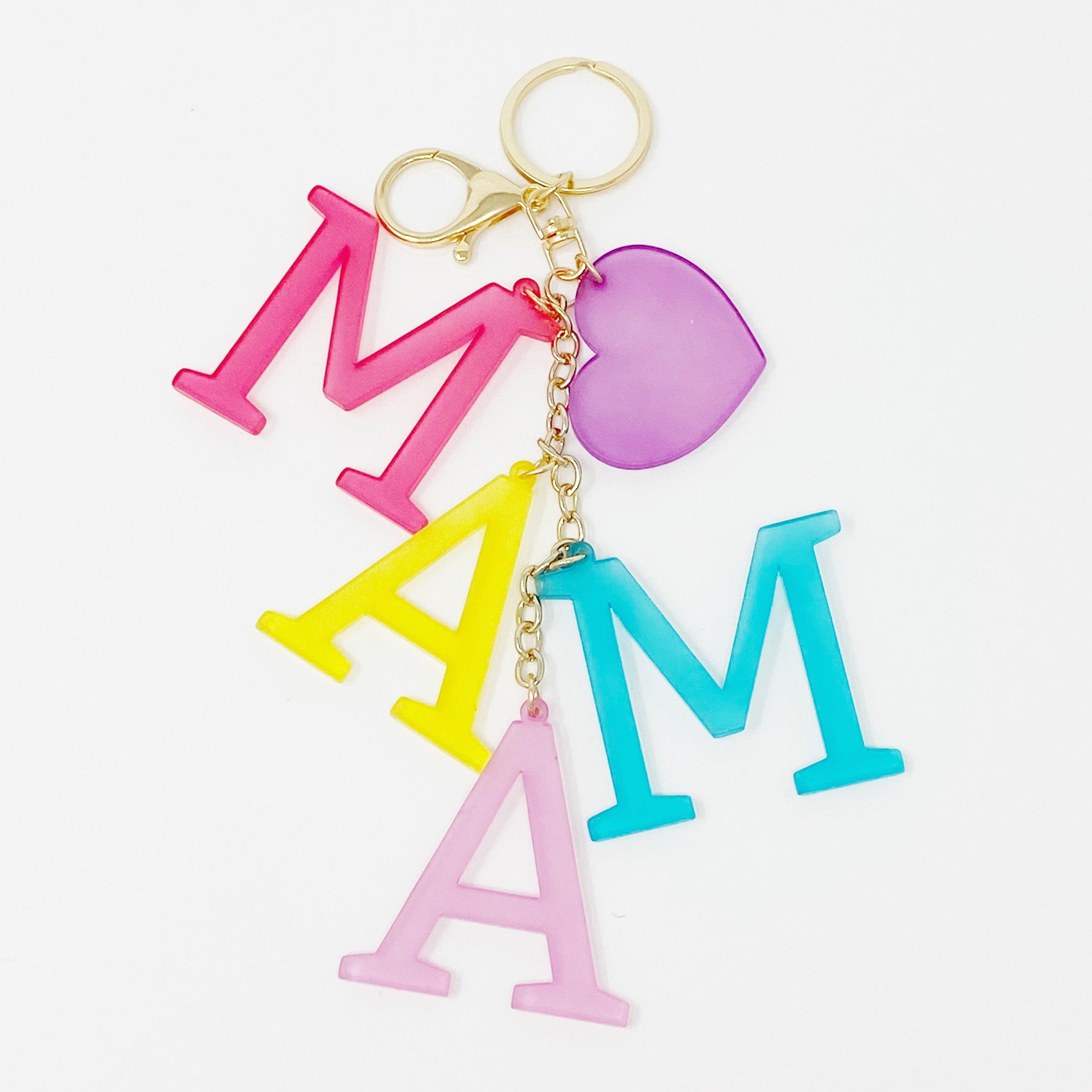 A stylish Favorite Word Jingle Key Chain featuring beautifully cut-out letters and gold tone hardware, perfect for keys or as a bag charm.