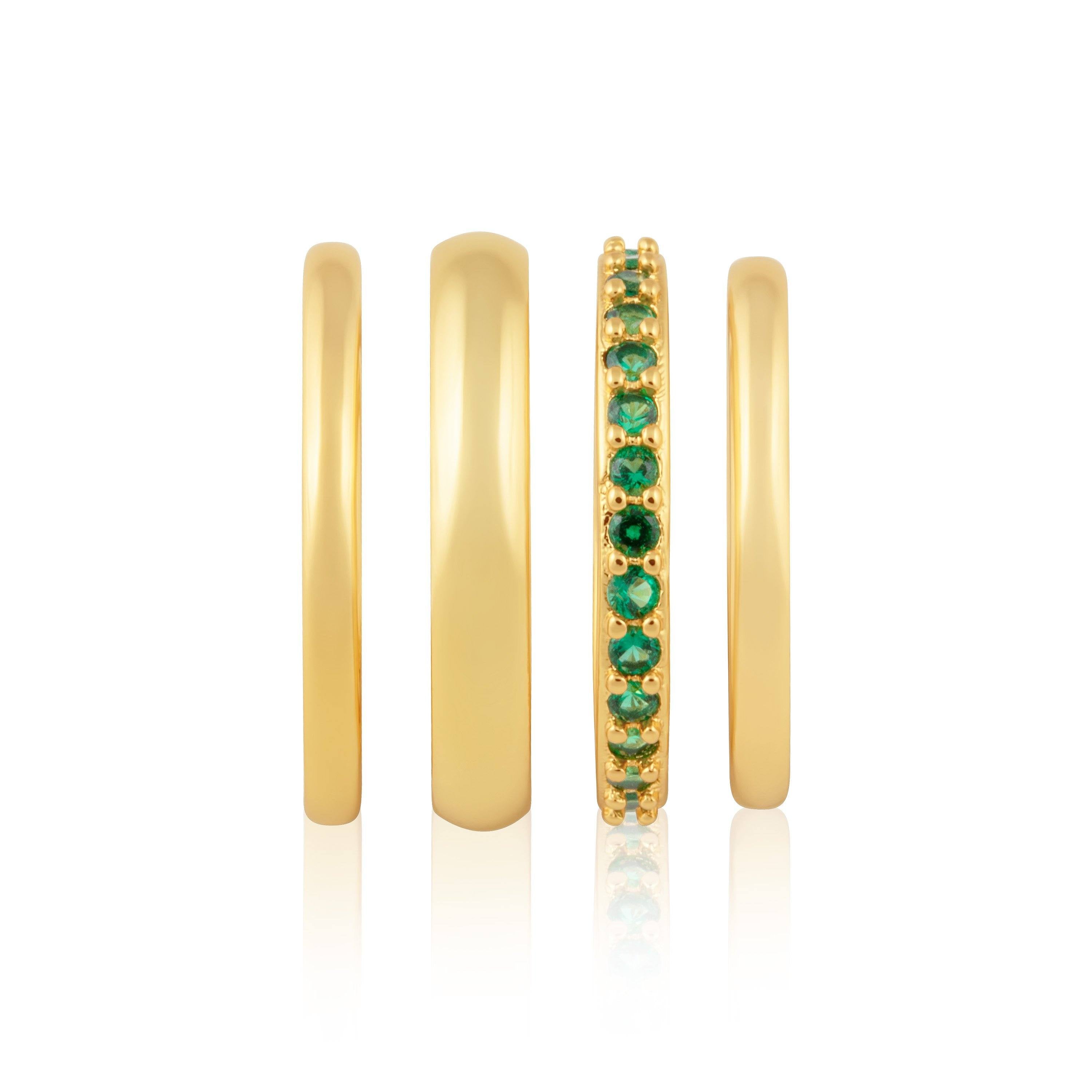 Faye Emerald Stacked Bands featuring 18k gold plated stainless steel with green cubic zirconia stones, elegantly stacked.