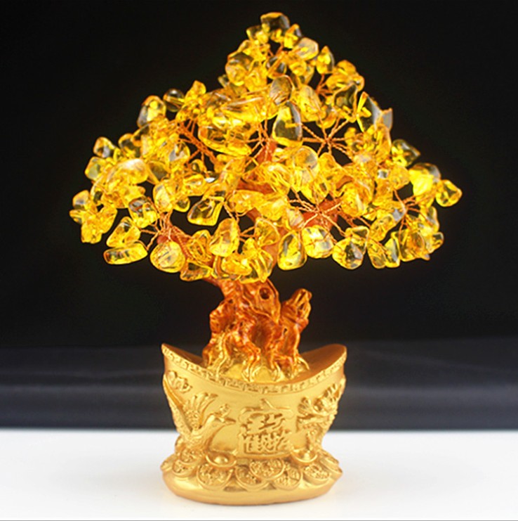 A beautiful Feng Shui Citrine Money Tree with crystal leaves and a golden money bag base, symbolizing wealth and prosperity.