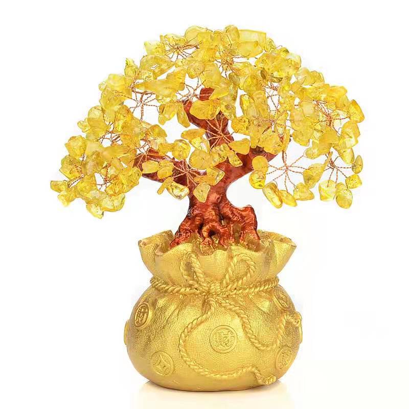 A beautiful Feng Shui Citrine Money Tree with crystal leaves and a golden money bag base, symbolizing wealth and prosperity.