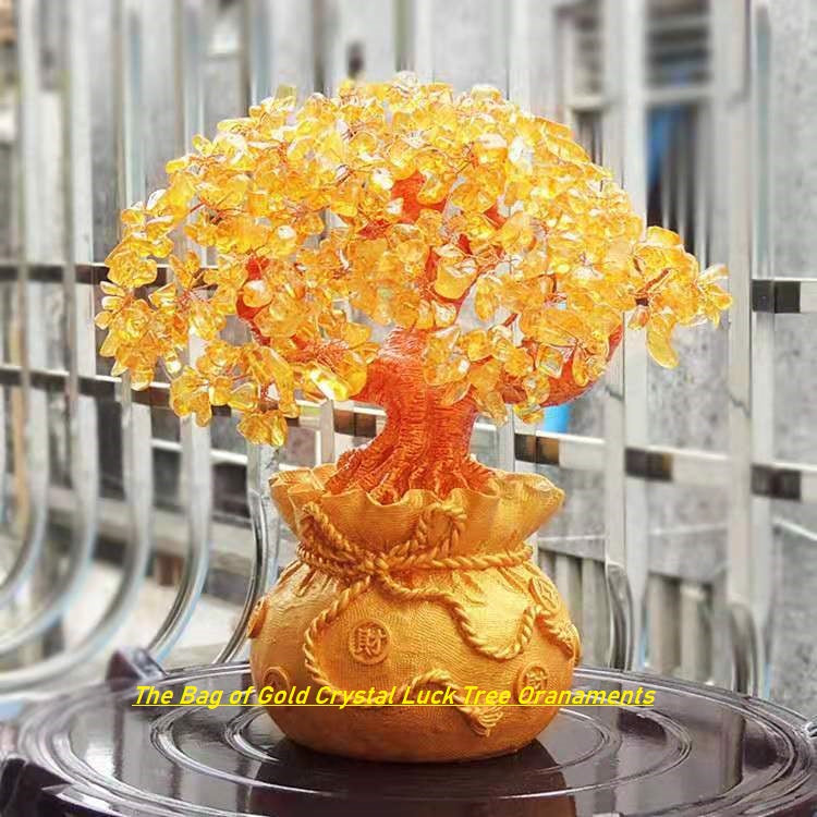 A beautiful Feng Shui Citrine Money Tree with crystal leaves and a golden money bag base, symbolizing wealth and prosperity.