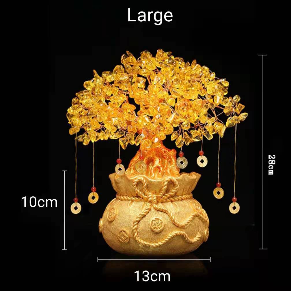 A beautiful Feng Shui Citrine Money Tree with crystal leaves and a golden money bag base, symbolizing wealth and prosperity.