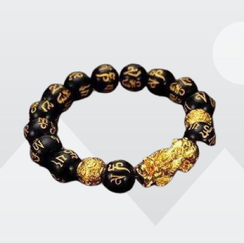 Feng Shui Pi Xiu Black Obsidian Wealth Bracelet with 10mm beads, showcasing its elegant design and deep black color.