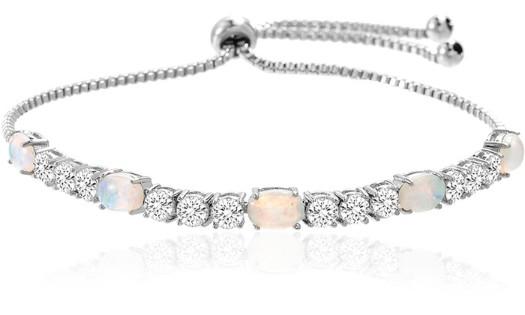 A stunning Fiery Opal Tennis Bracelet featuring genuine opal and sparkling crystals, elegantly plated in 18K white gold.