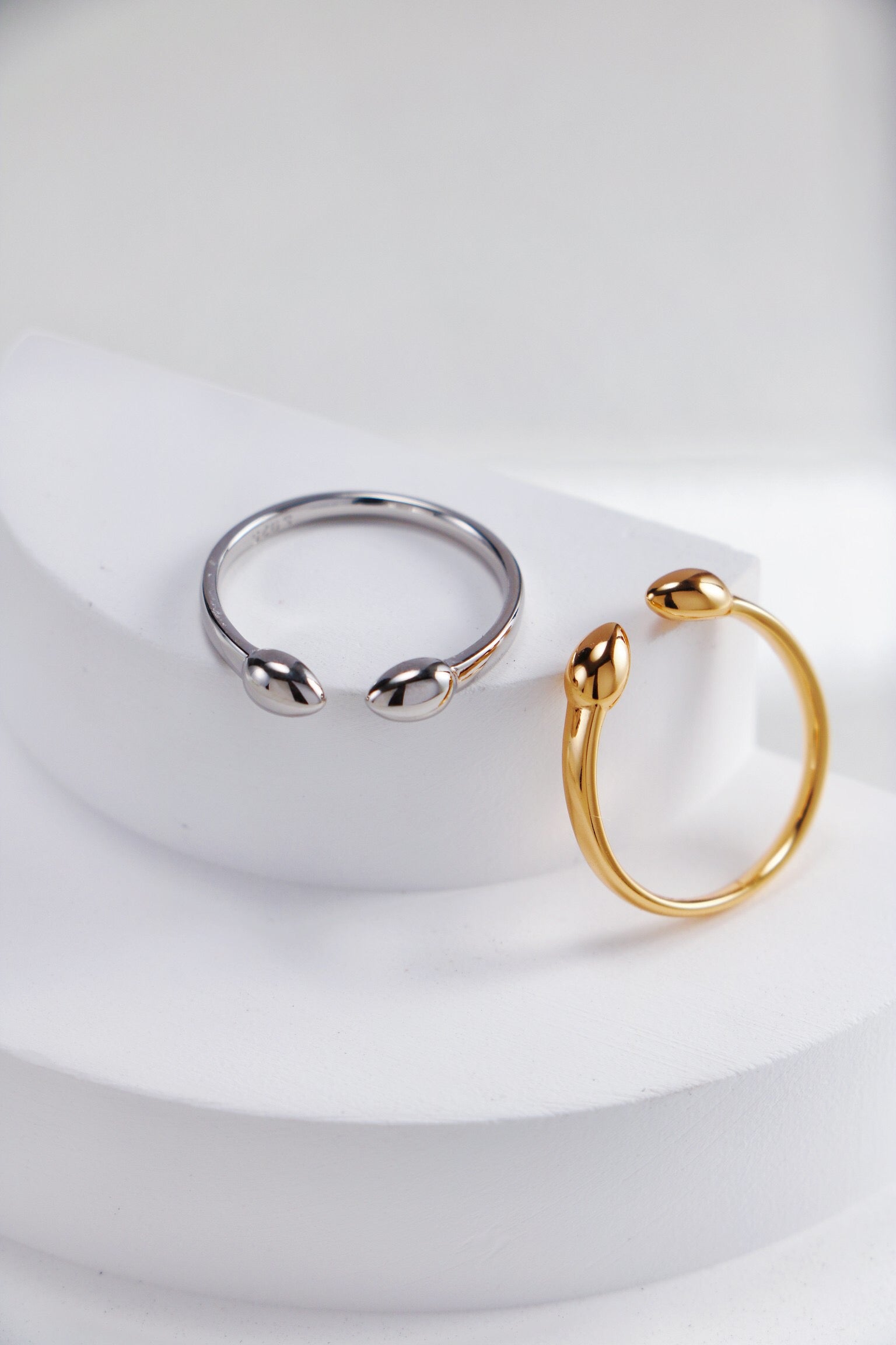 Fiji Bud Stacking Ring made of gold vermeil, showcasing its elegant design and shiny finish.