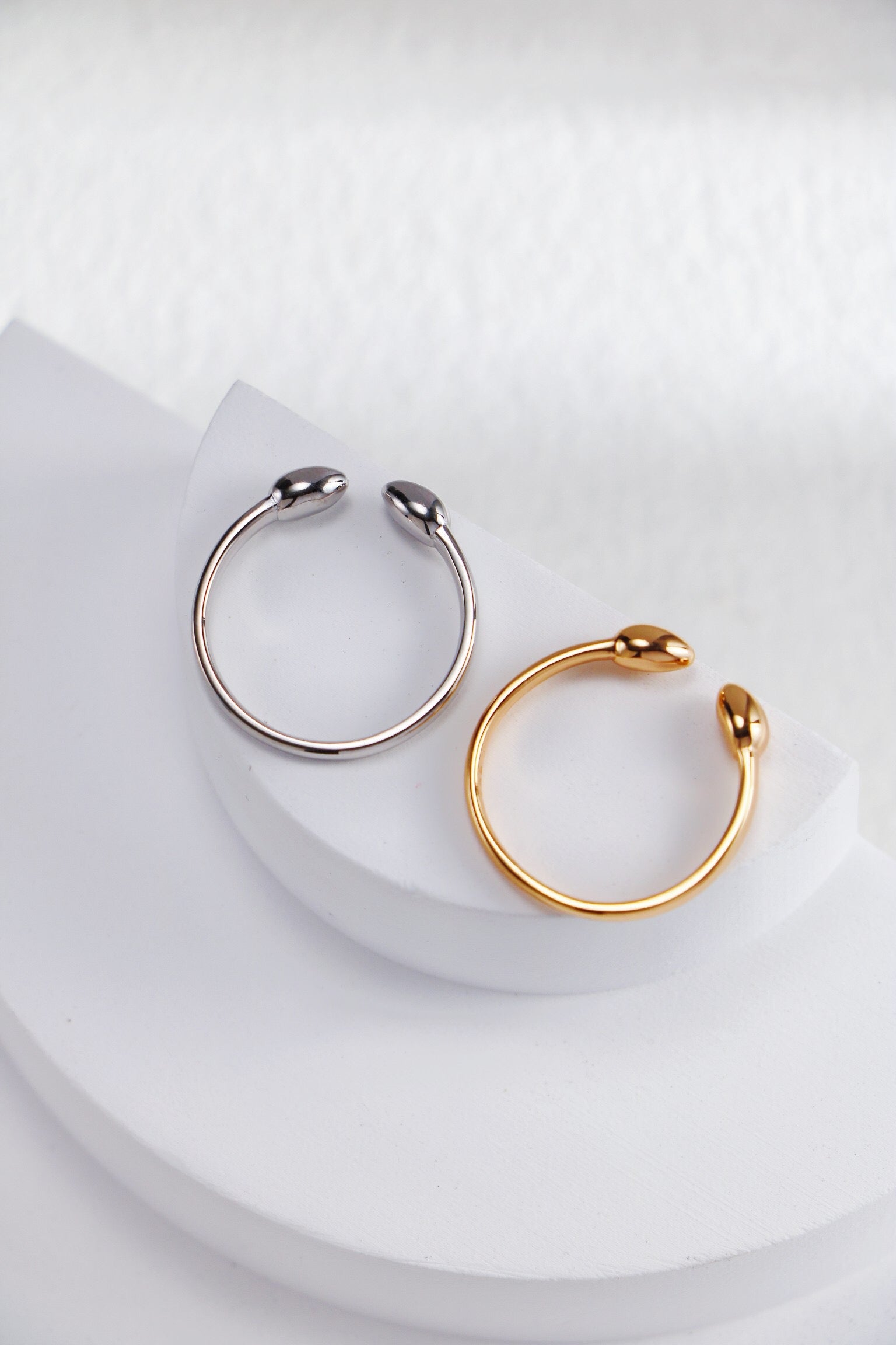 Fiji Bud Stacking Ring made of gold vermeil, showcasing its elegant design and shiny finish.