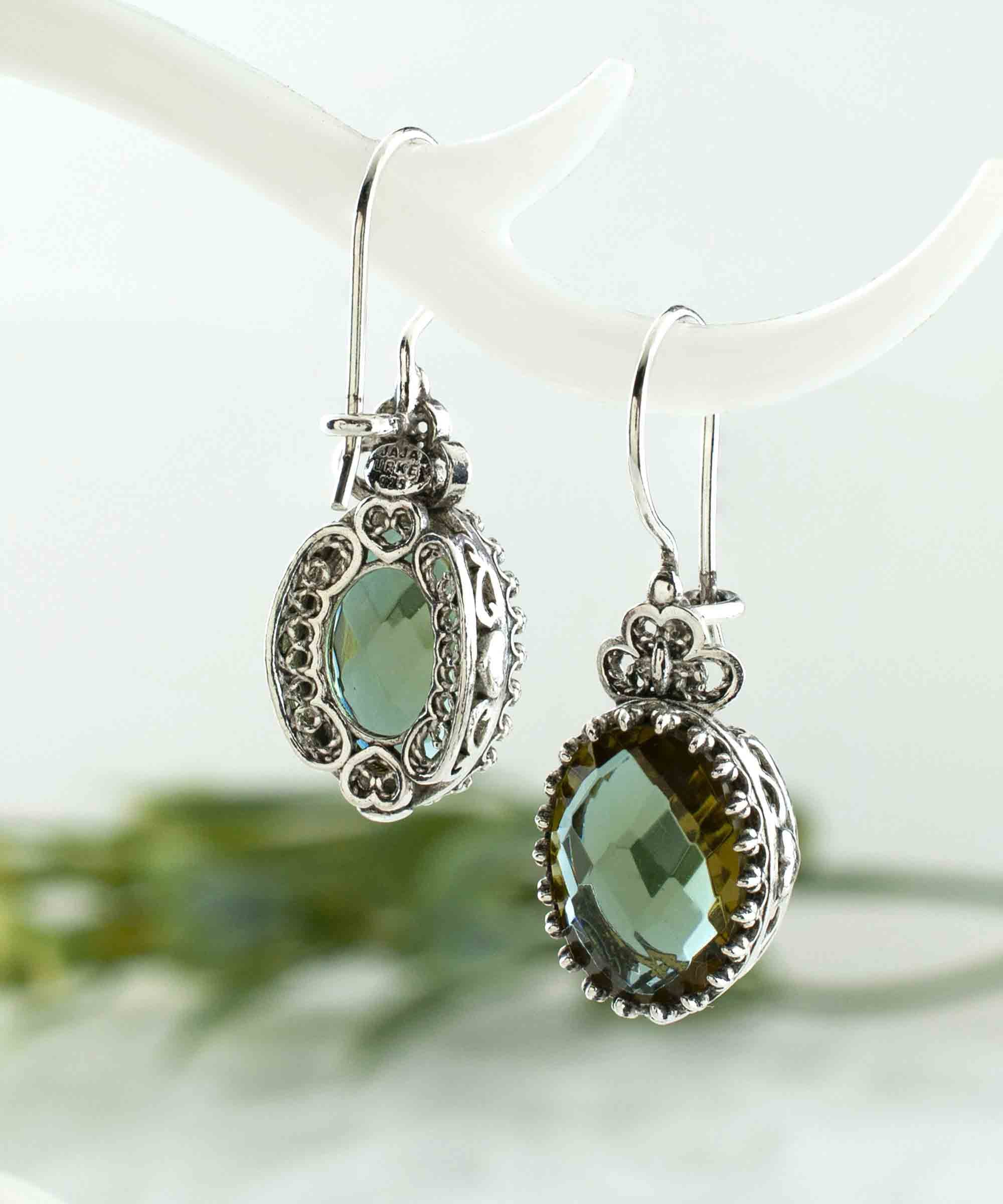 Elegant 925 sterling silver drop earrings featuring intricate filigree heart design and double-sided oval cut alexandrite gemstone.