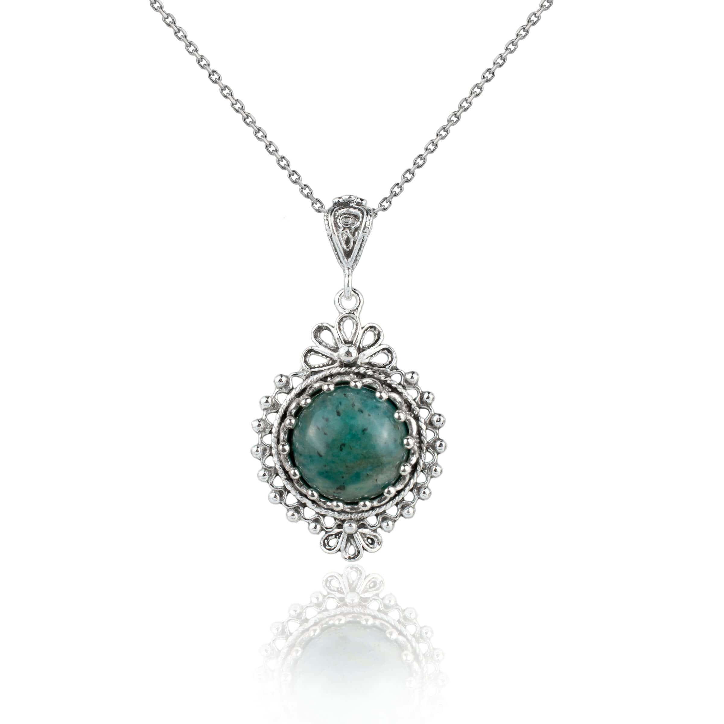 Elegant silver boho pendant necklace featuring a natural amazonite gemstone in a delicate filigree design.