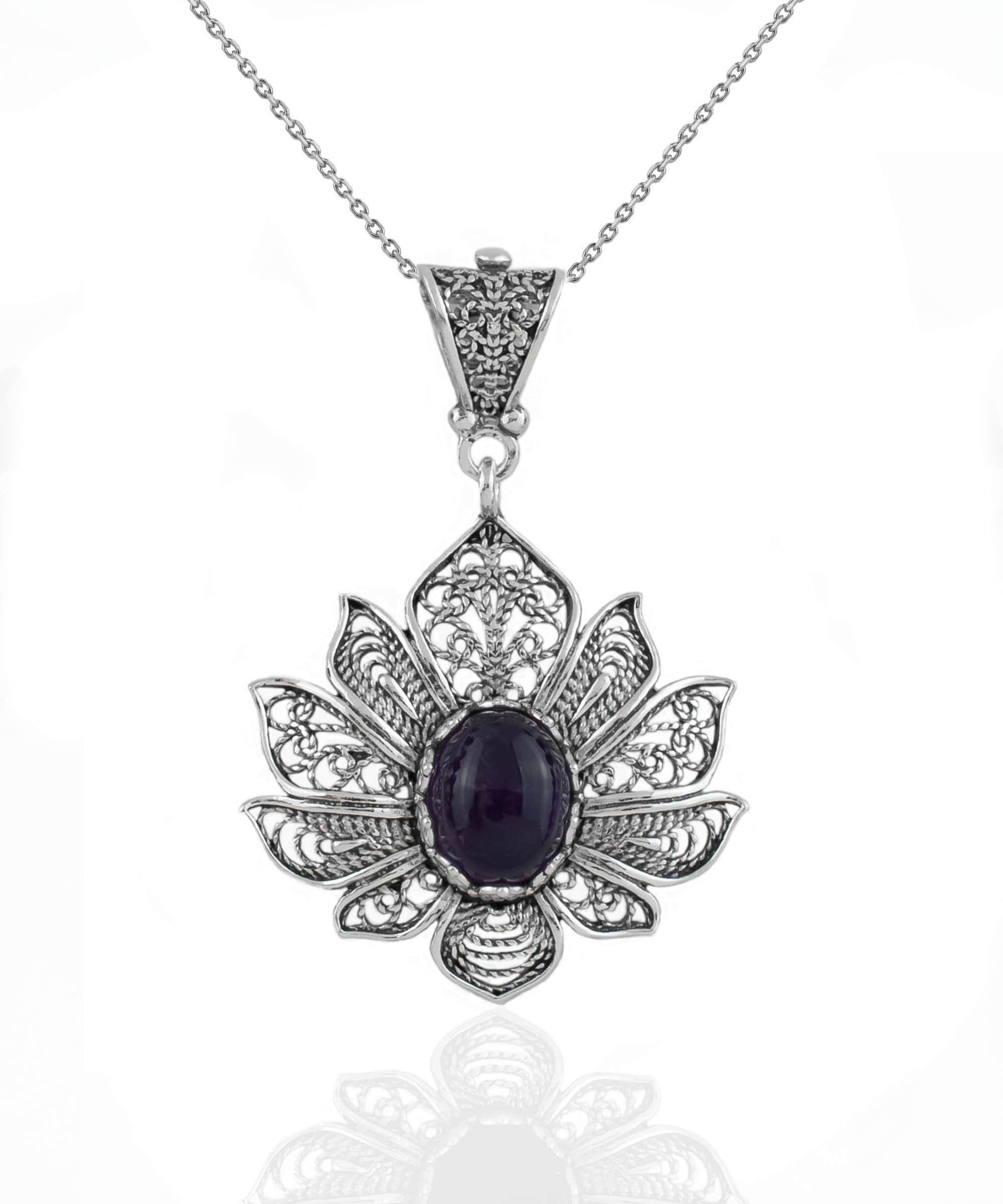 Handcrafted 925 Sterling Silver pendant featuring a filigree lotus flower design with an oval-cut Amethyst gemstone.