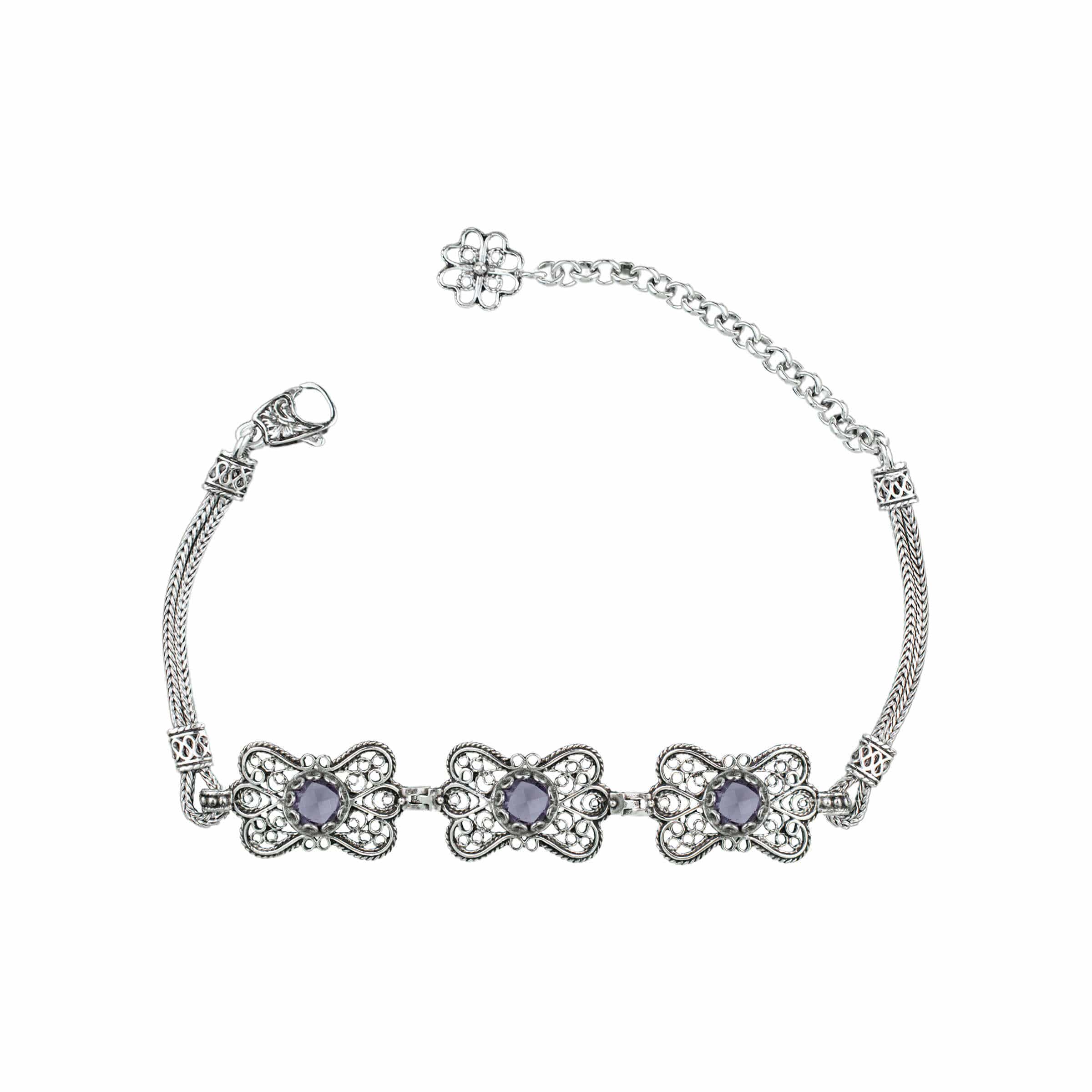 Sterling silver filigree butterfly bracelet featuring a faceted 6mm round amethyst gemstone, elegantly designed with intricate details.