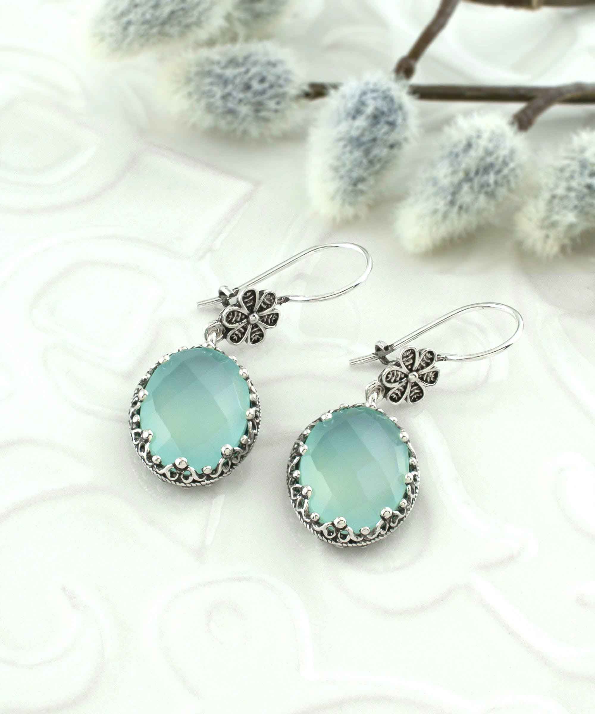 Elegant 925 sterling silver dangle earrings featuring aqua chalcedony and intricate filigree art design.