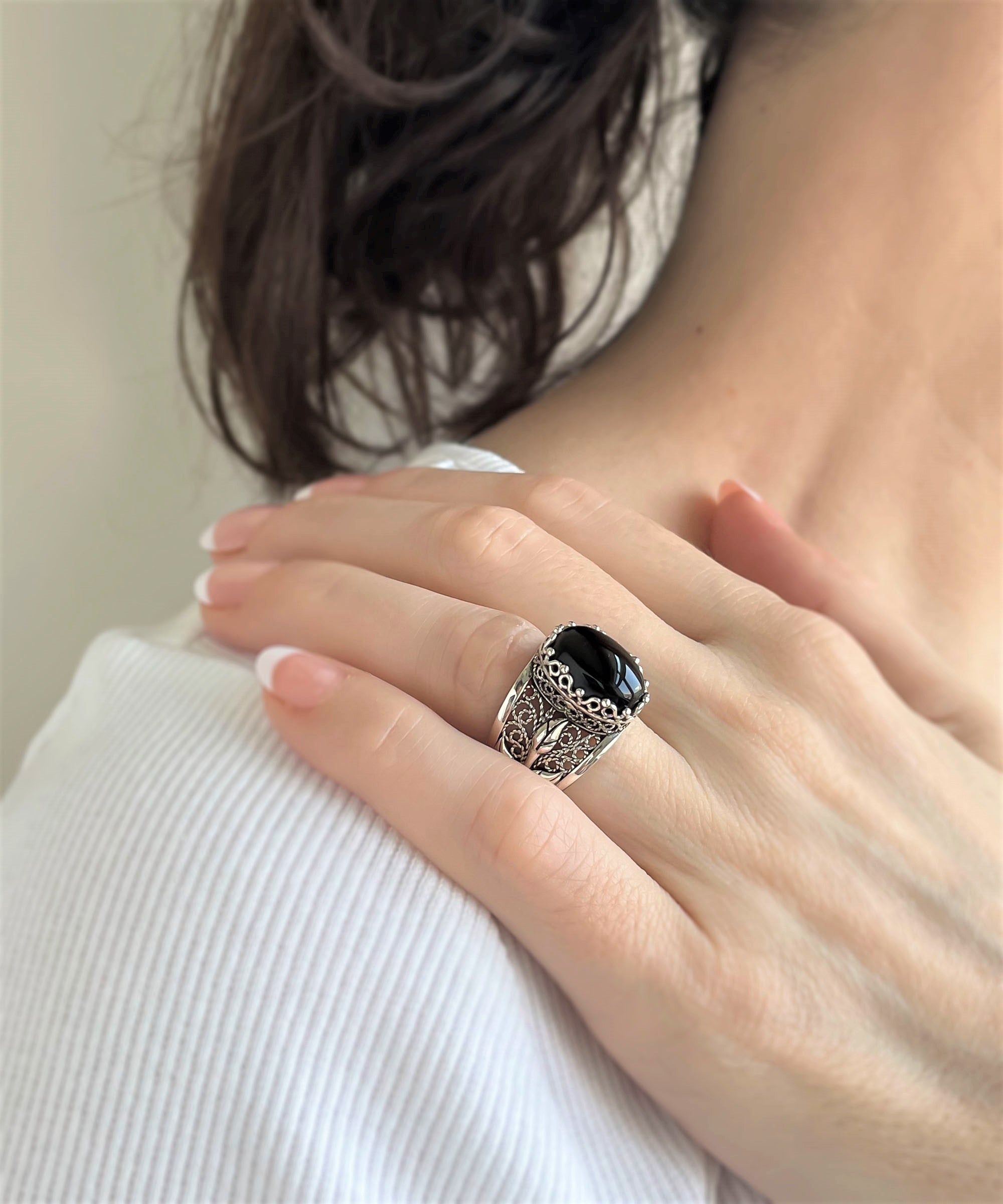 Elegant Filigree Art Black Onyx Gemstone Tulip Detailed Silver Women Statement Ring with intricate design and polished finish.