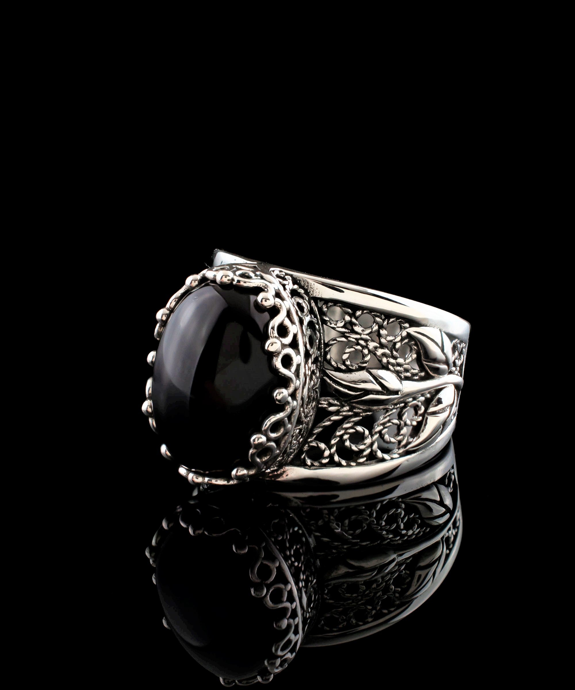 Elegant Filigree Art Black Onyx Gemstone Tulip Detailed Silver Women Statement Ring with intricate design and polished finish.