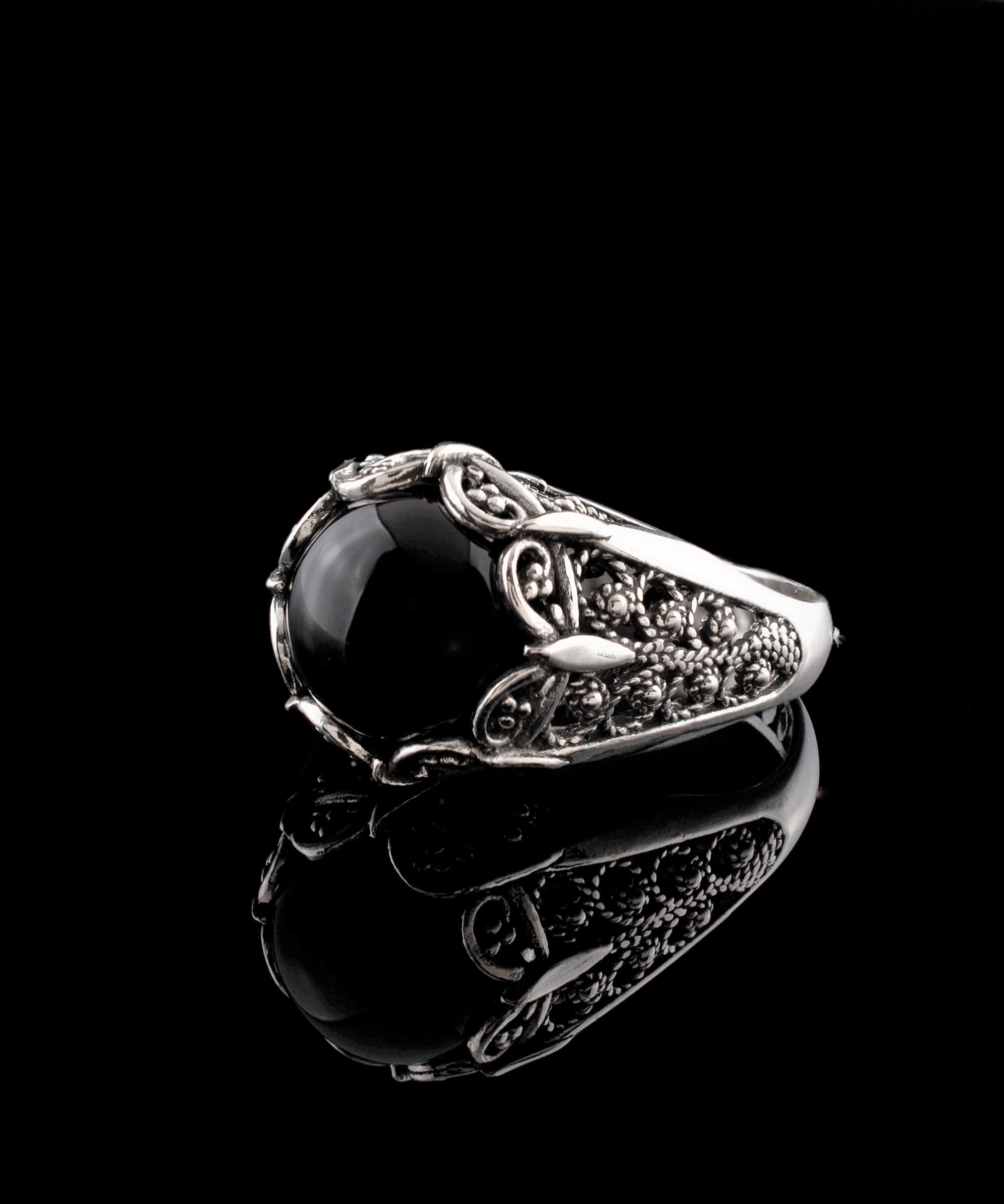 Elegant Filigree Art Black Onyx Gemstone Silver Cocktail Ring with intricate design and polished finish.