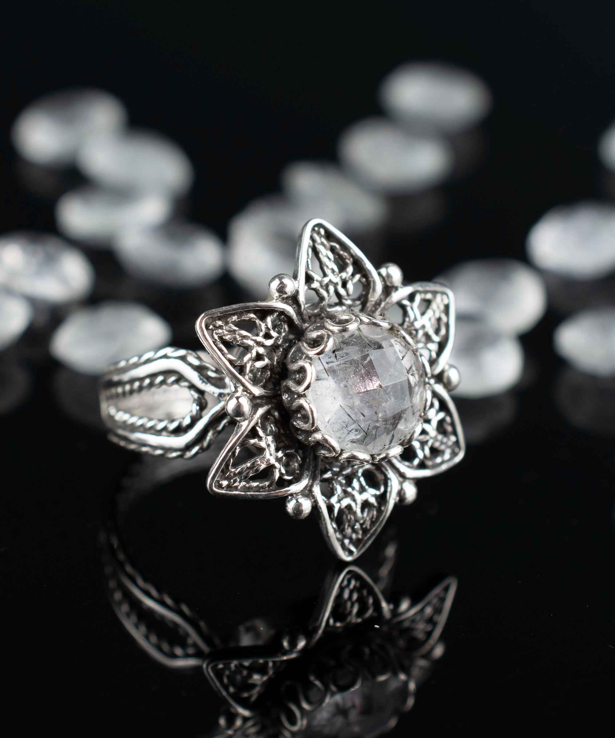 Elegant Filigree Art Black Rutile Gemstone Daisy Flower Cocktail Ring in sterling silver, showcasing intricate design and a round-cut gemstone.